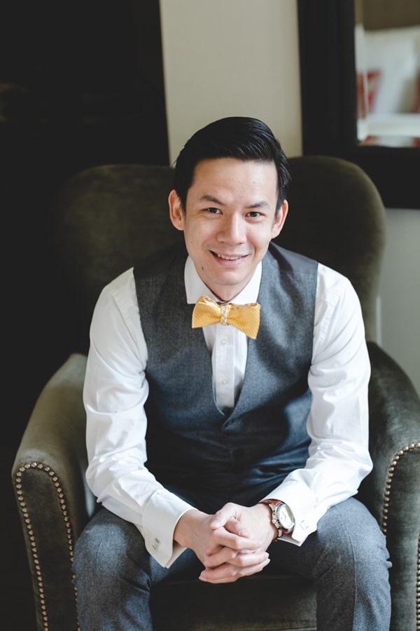 groom with yellow bowtie