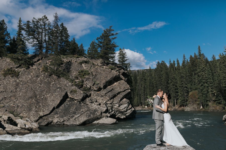 Kananaskis elopement bride & groom photos in the forest at Canoe Meadows
