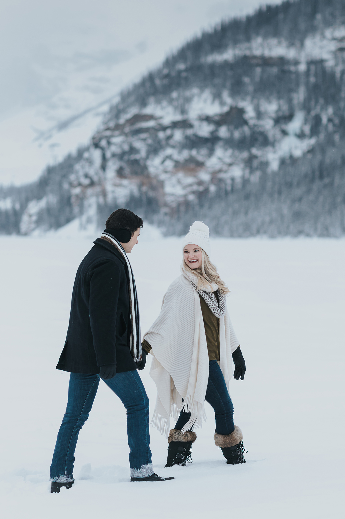 couples session walking in a winter wonderland in the Canadian Rocky mountains