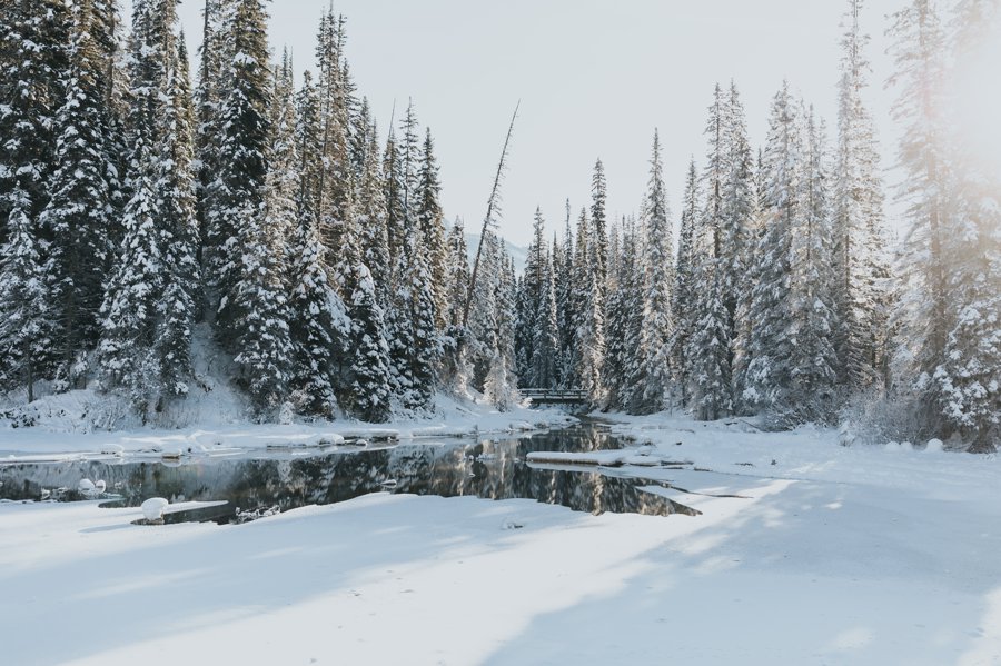 Emerald lake under a blanket of snow