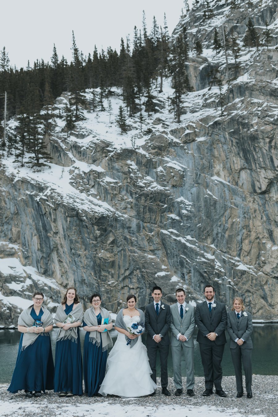 Canmore wedding photographers portraits mountains winter bridal party