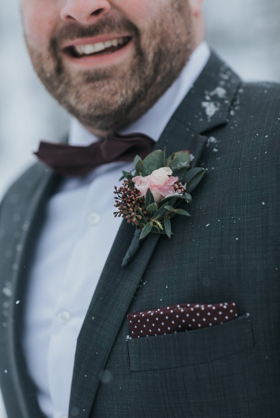 Snowy mountain wedding in the Canadian Rockies groom's boutonniere