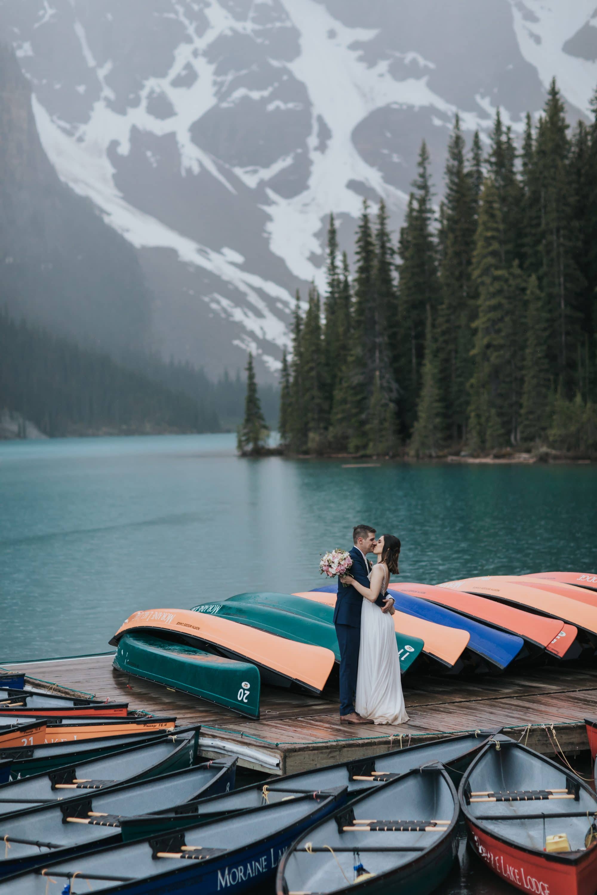 Moraine Lake Summer elopement canoes dock