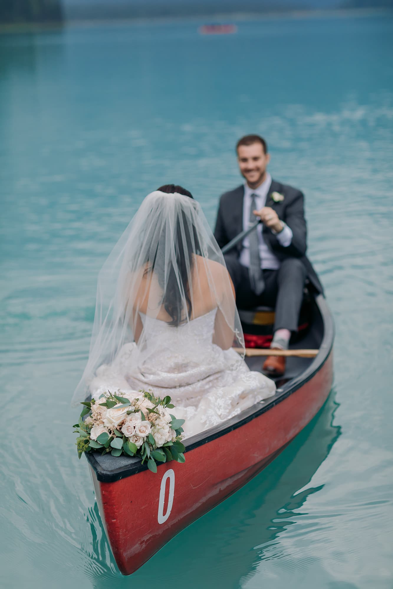 Emerald Lake Lodge Wedding Photos canoe on the lake