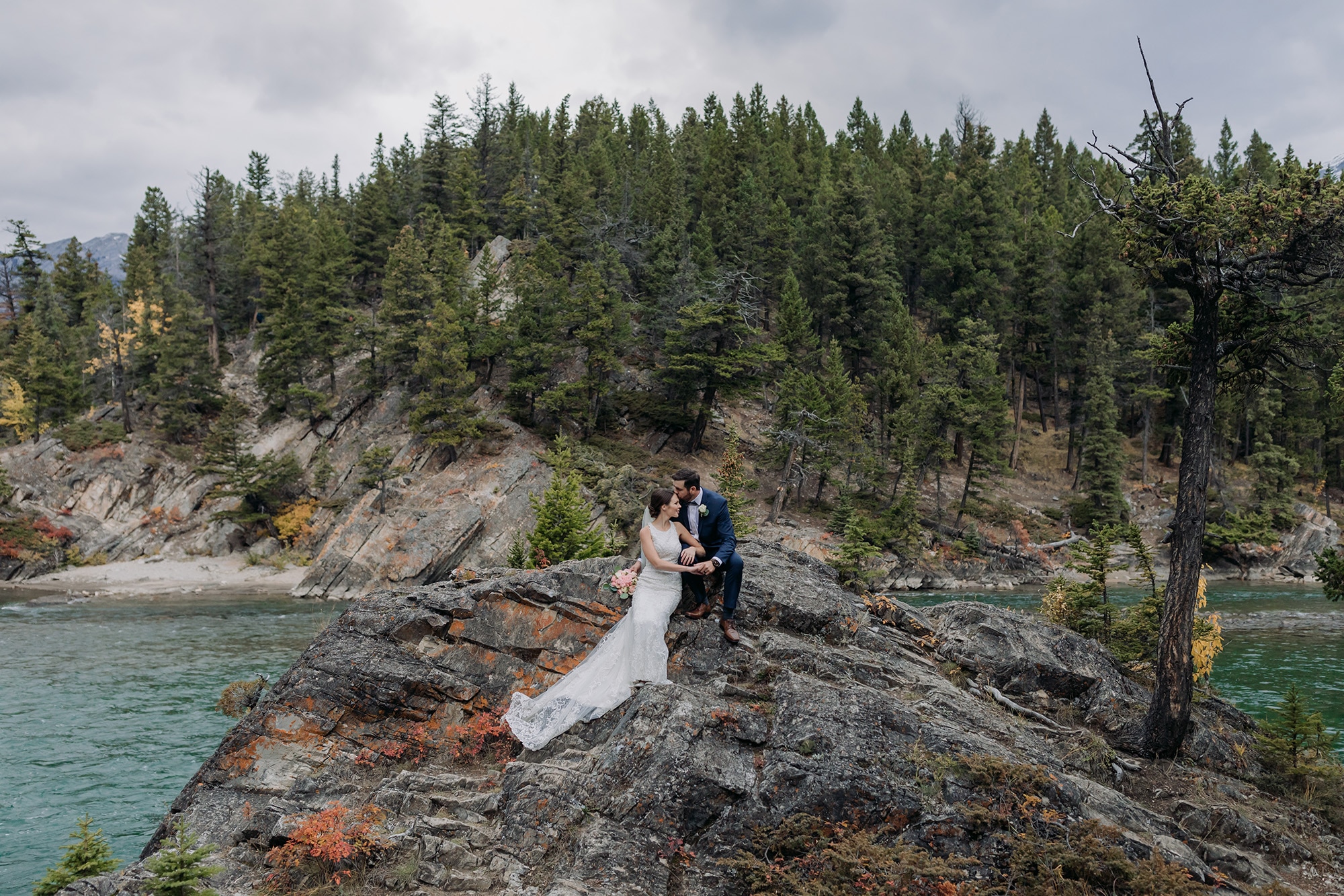 intimate banff wedding photos at Bow Falls
