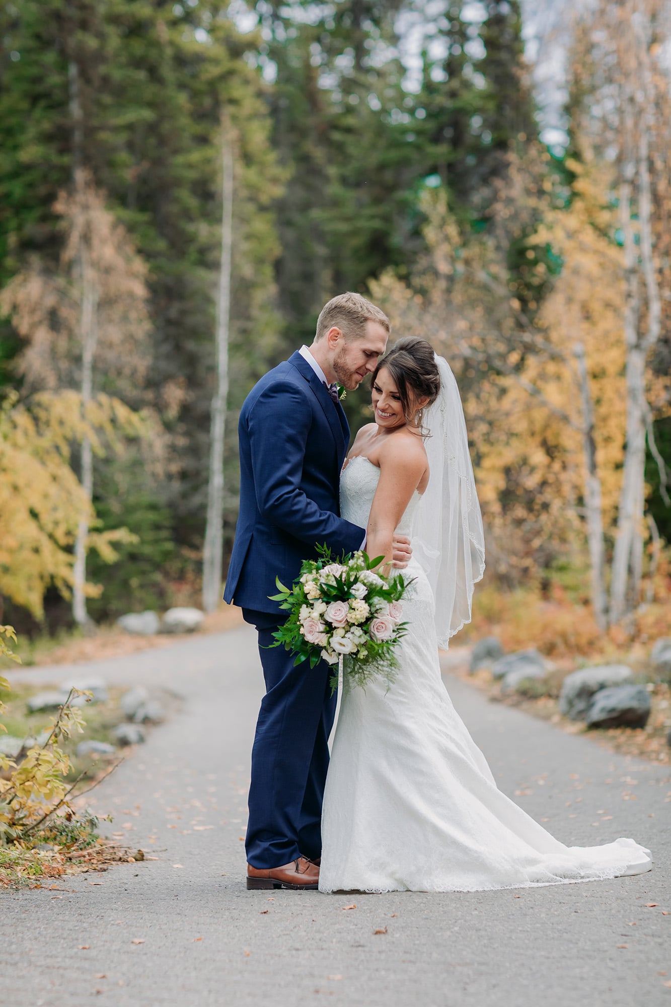 mountain elopement emerald lake lodge bride groom photos cabins