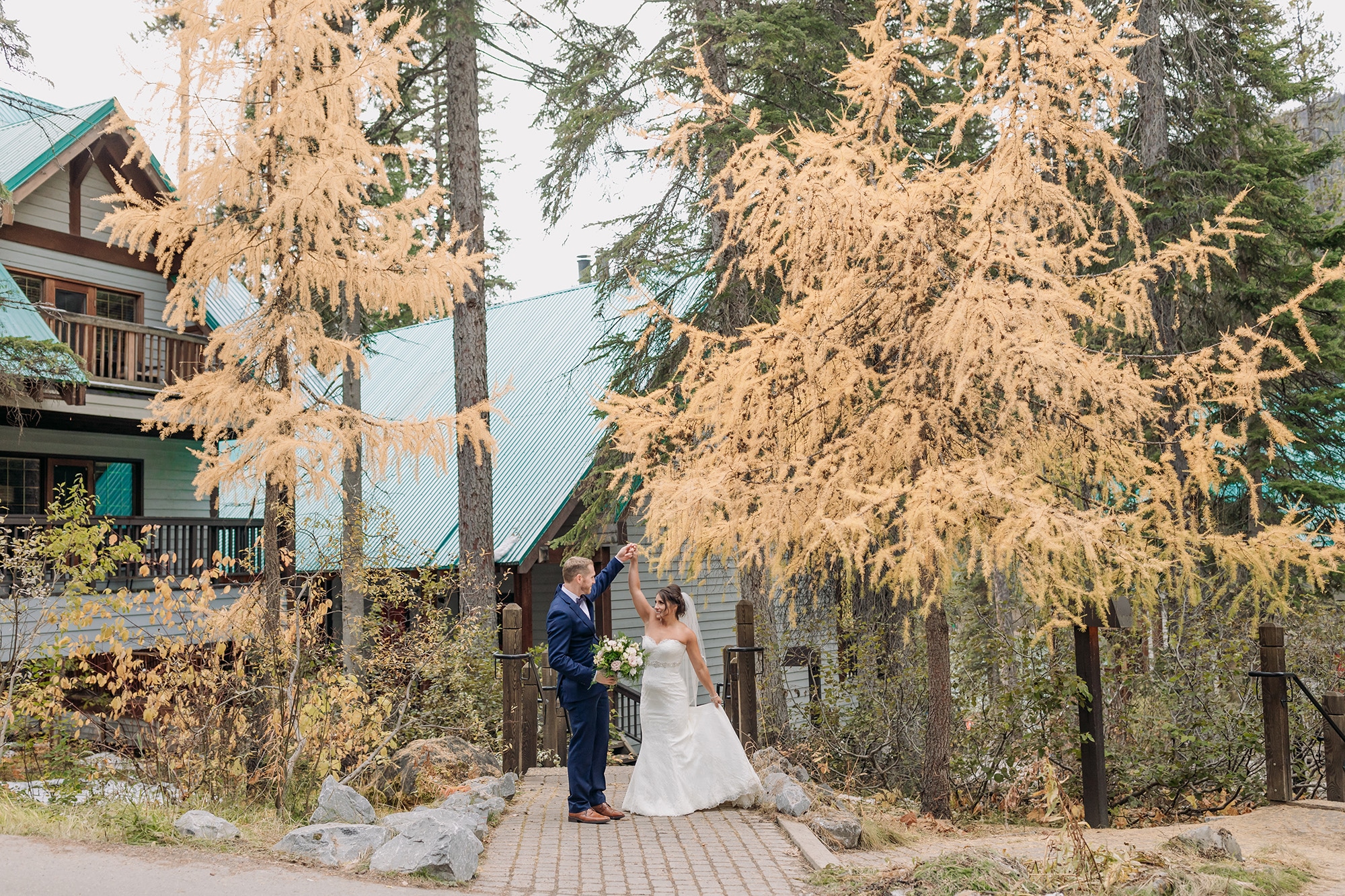 mountain eleopement emerald lake lodge bride groom photos cabins