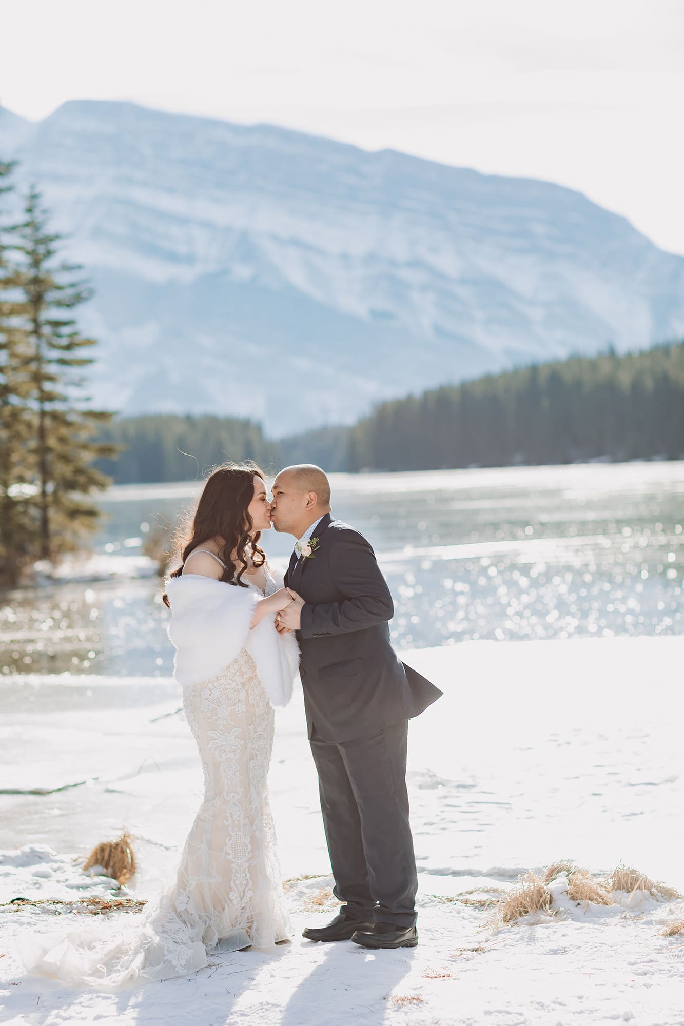 outdoor wedding ceremony overlooking sparkly frozen Two-Jack Lake