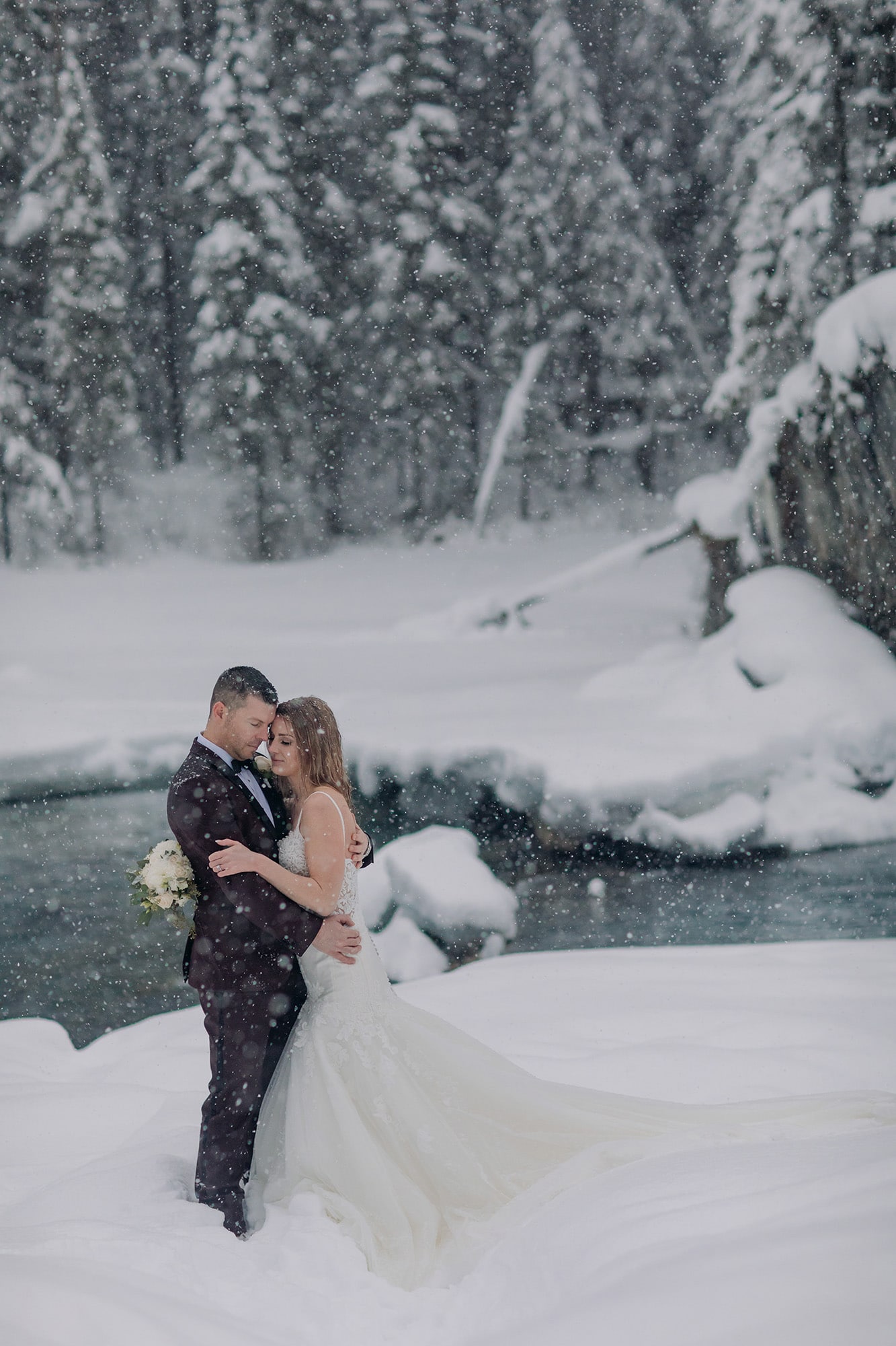 magical winter wonderland wedding portraits natural bridge yoho