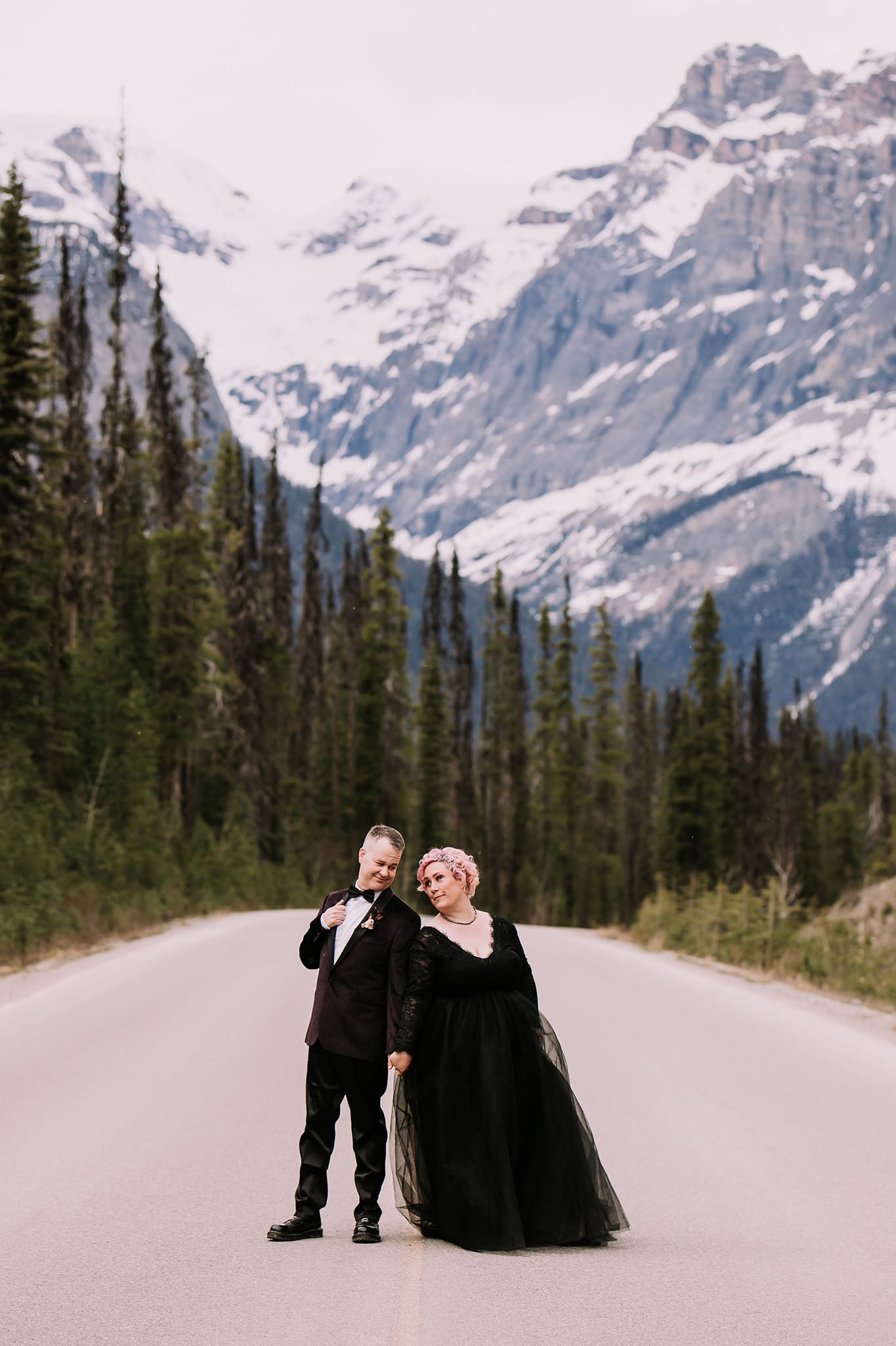 alternative bride groom in road to mountains at Emerald Lake