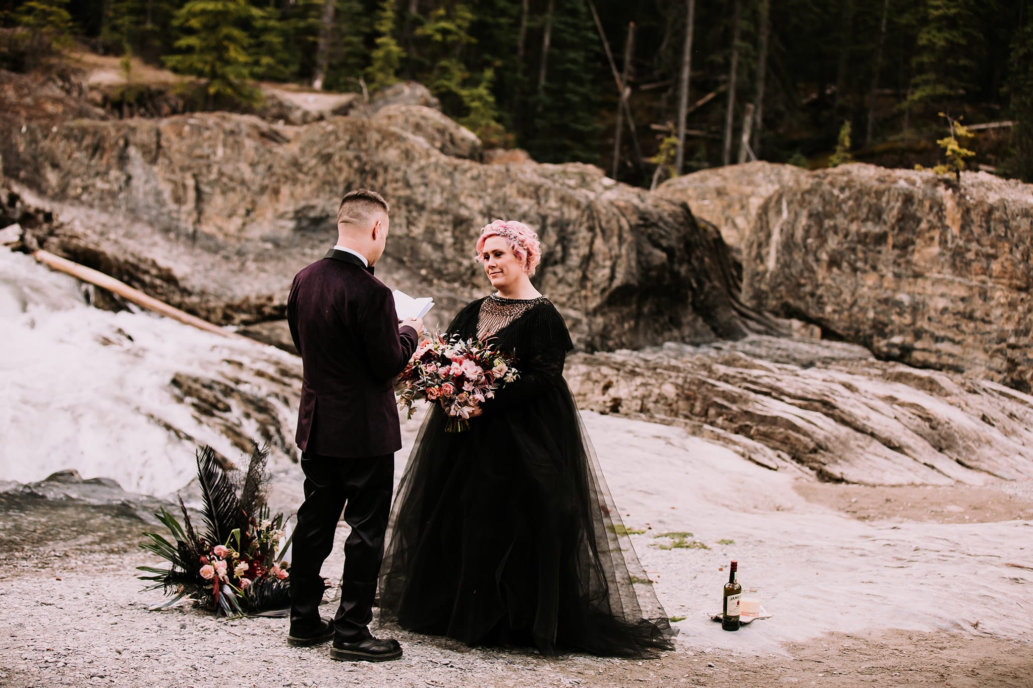 dream mountain vow renewal natural bridge yoho national park bride in black wedding gown gothic inspired dark wedding