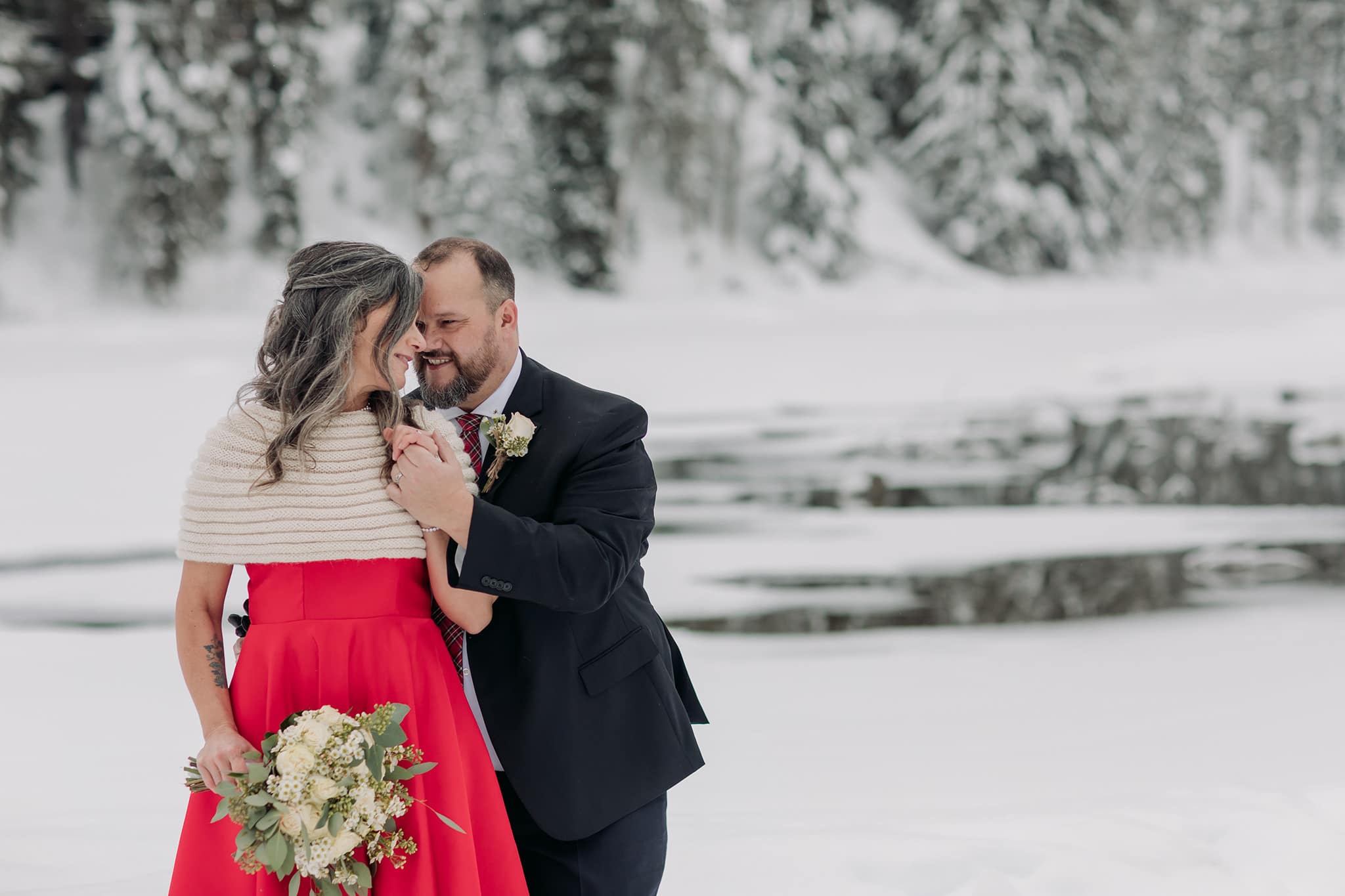 Emerald Lake Lodge Winter elopement bridal groom wedding portraits in the snow