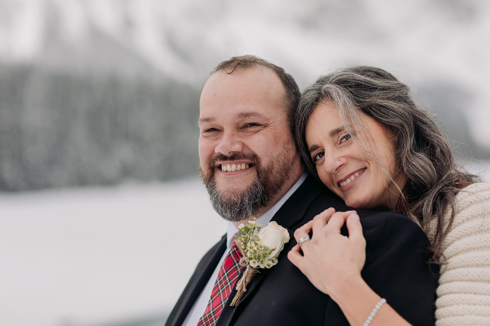 Emerald Lake Lodge Winter elopement bridal groom wedding portraits in the snow