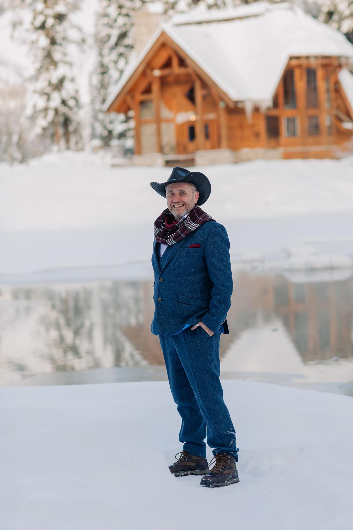groom at emerald lake lodge in winter New Years Eve Elopement