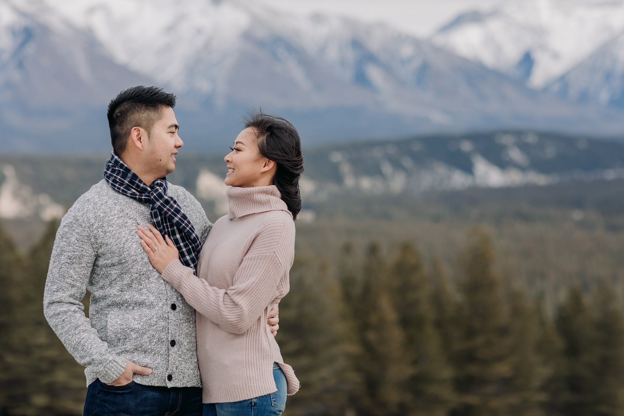 Banff National Park early winter November engagement session on a windy day at Tunnel Mountain