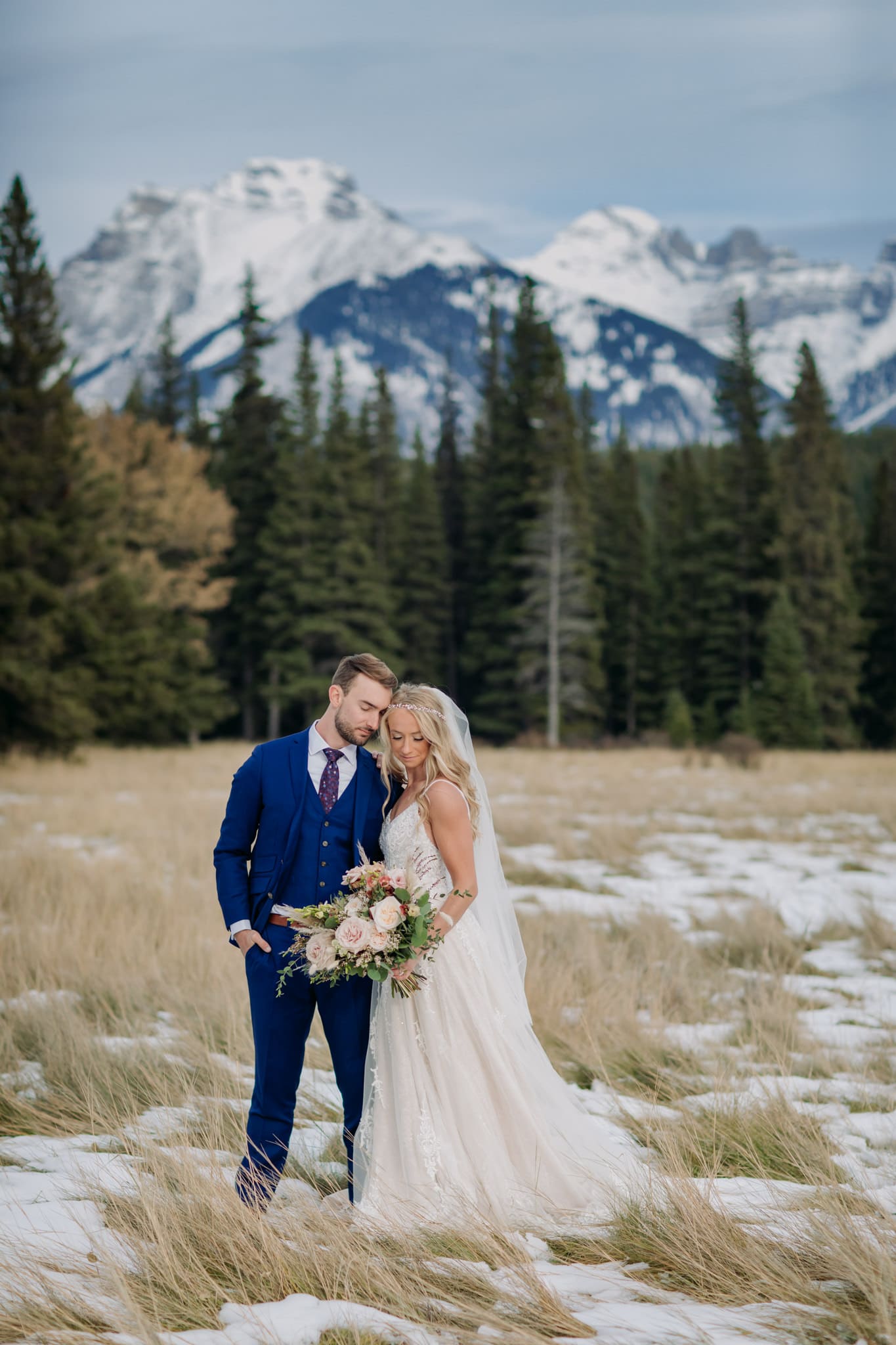 A Guide to Eloping in the Canadian Rockies | Mountain Wedding photographed by ENV Photography | fall wedding in Banff National Park with fresh snow