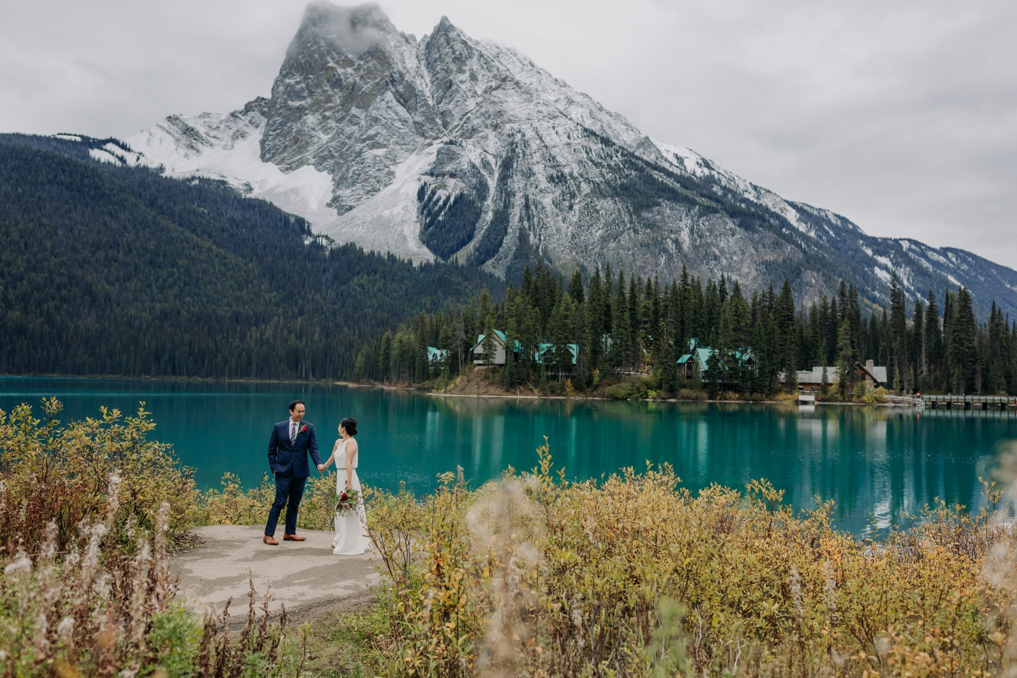 A Guide to Eloping in the Canadian Rockies | Mountain Wedding photographed by ENV Photography | Emerald Lake Lodge autumn elopement in the mountains