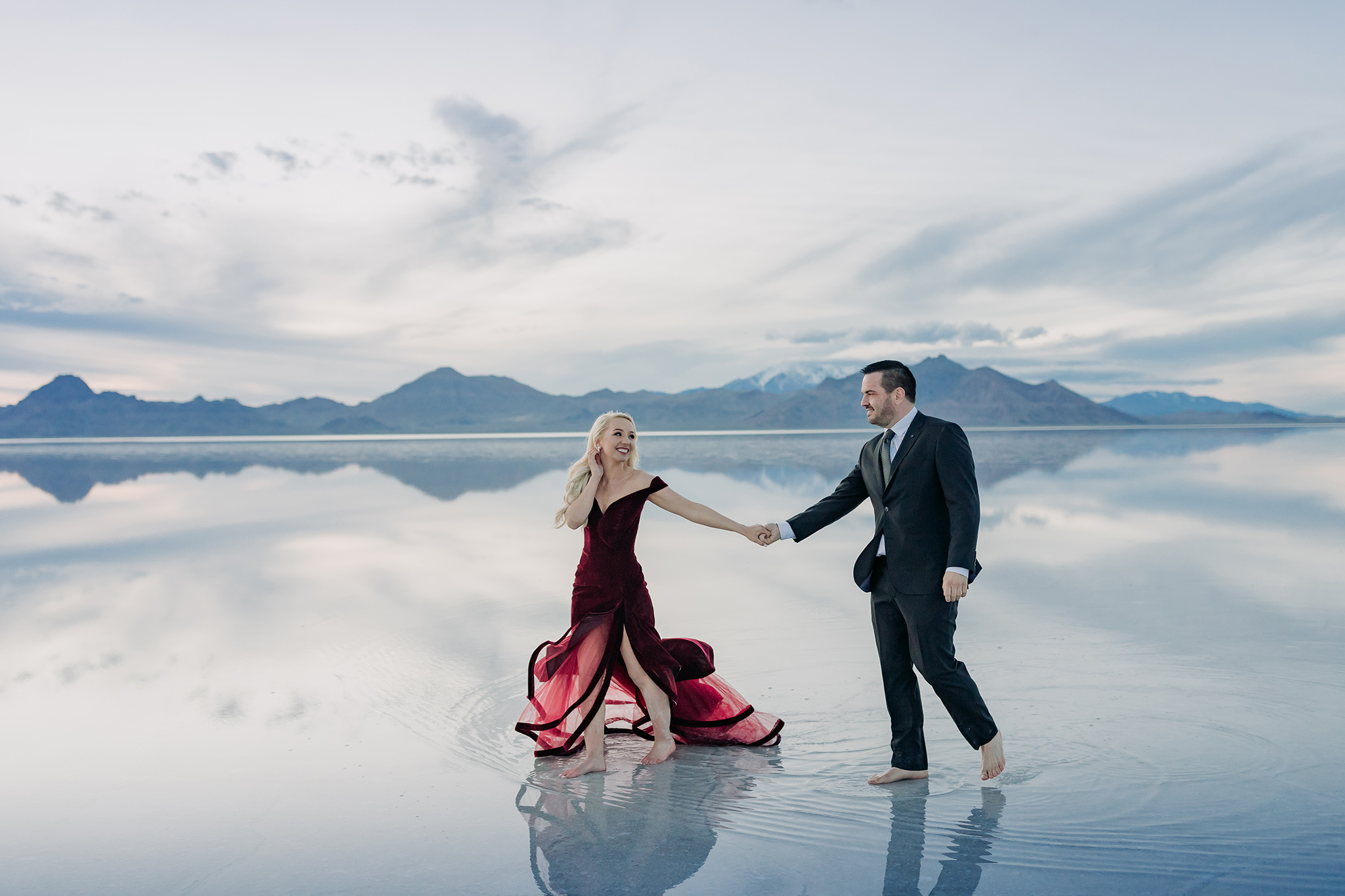 Bonneville Salt Flats flooded at Sunset for epic couples engagement session by ENV Photography