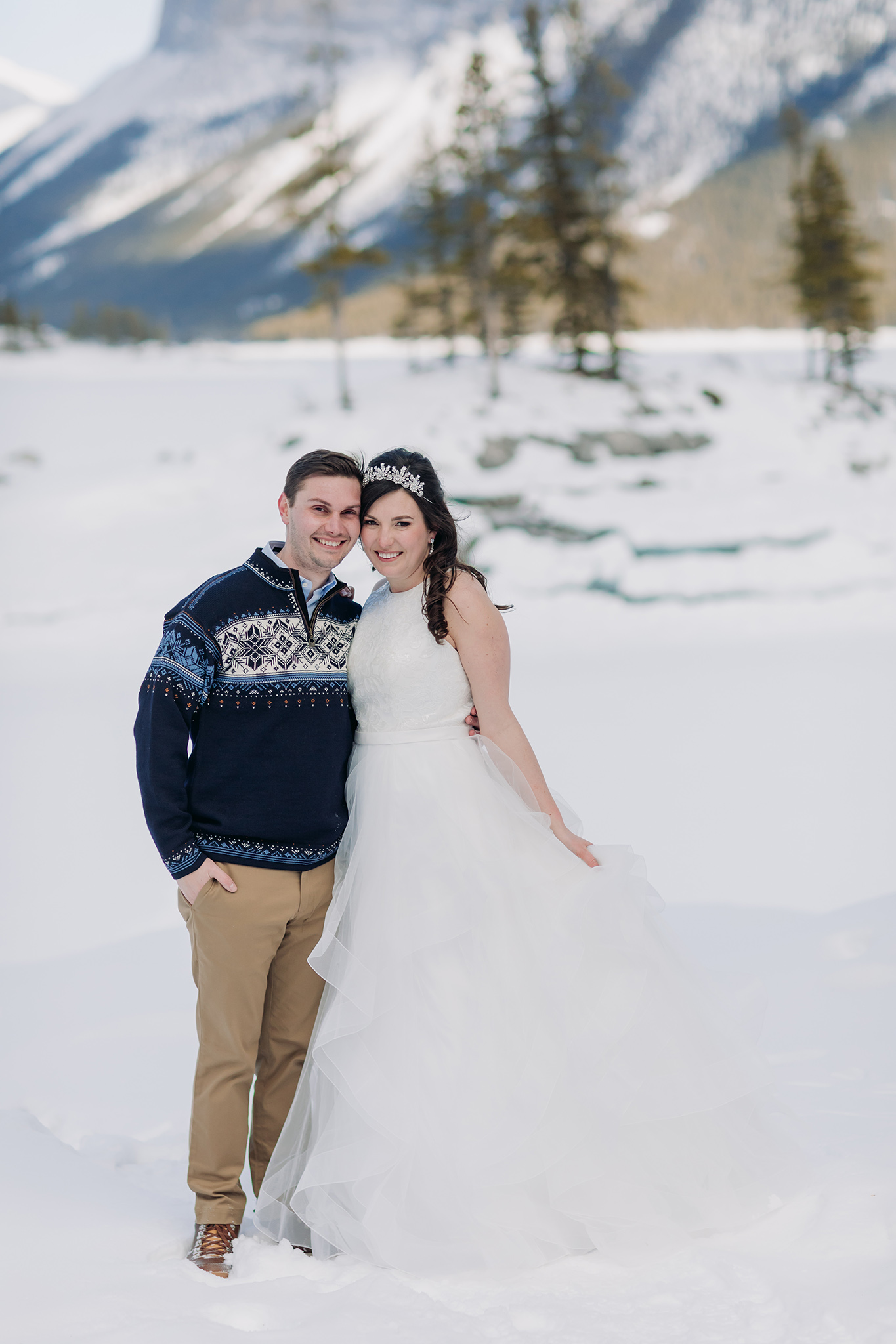 Lake Minnewanka Banff wedding portraits winter in the mountains photographed by ENV Photography