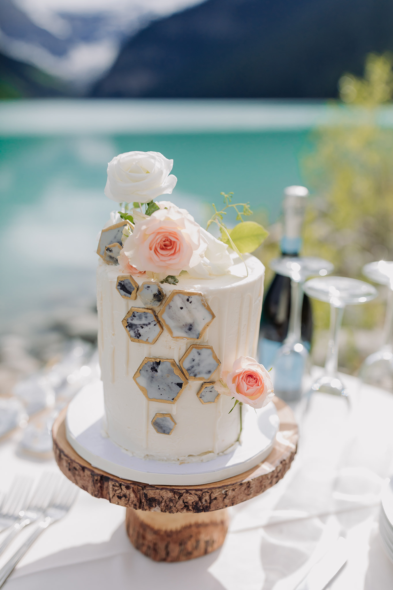 lake louise wedding cake at wedding ceremony