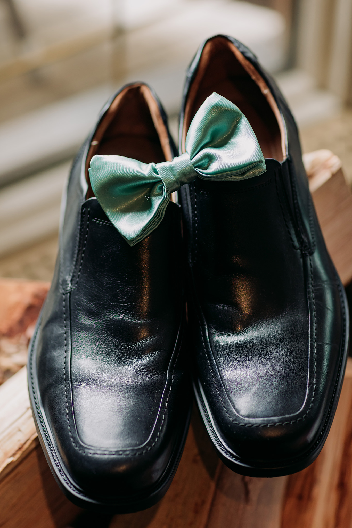 Emerald Lake Lodge elopement wedding details mint green bowtie & groom's shoes