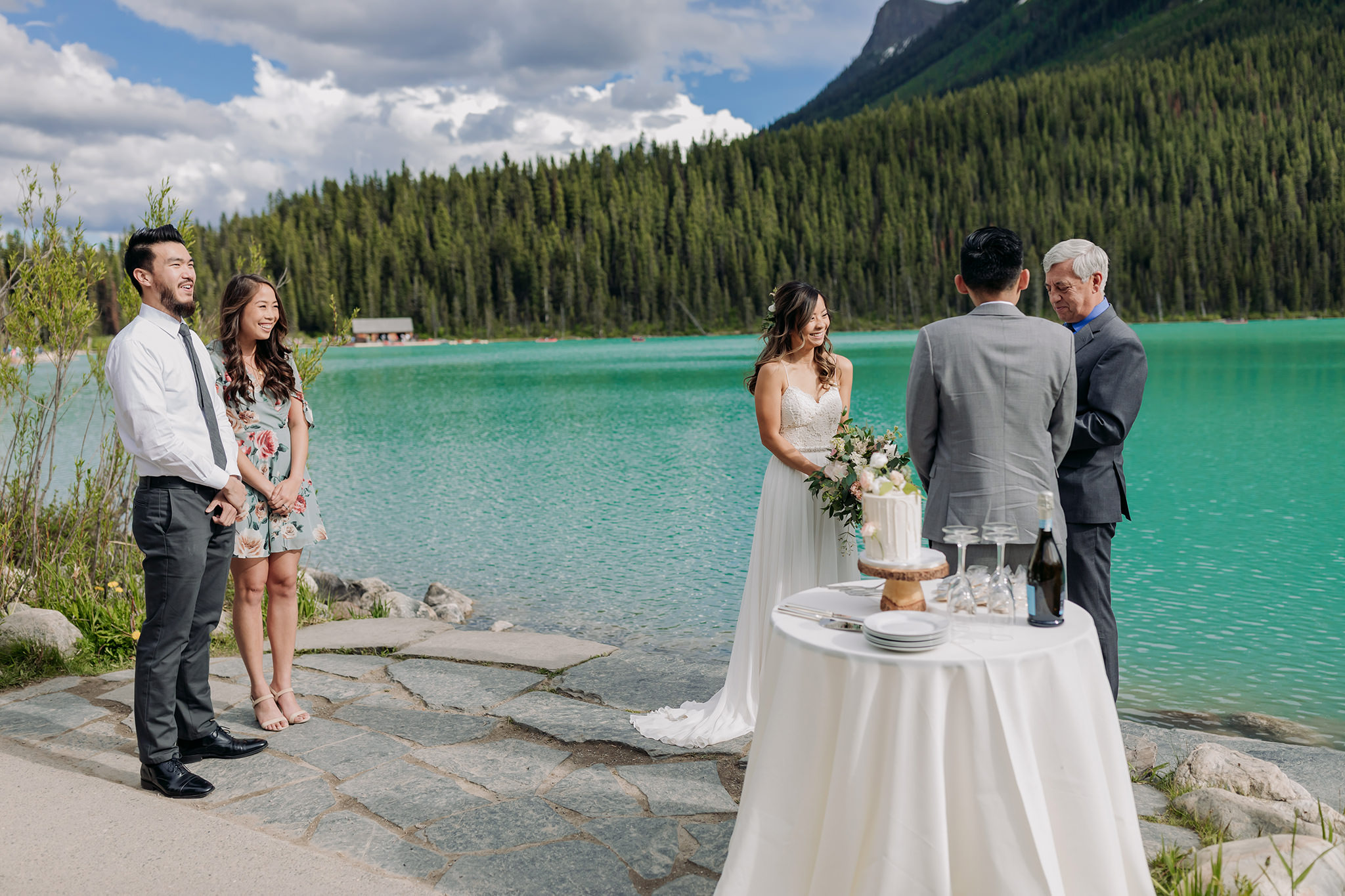 Lake Louise lakeshore wedding ceremony photographed by elopement photographer ENV Photography