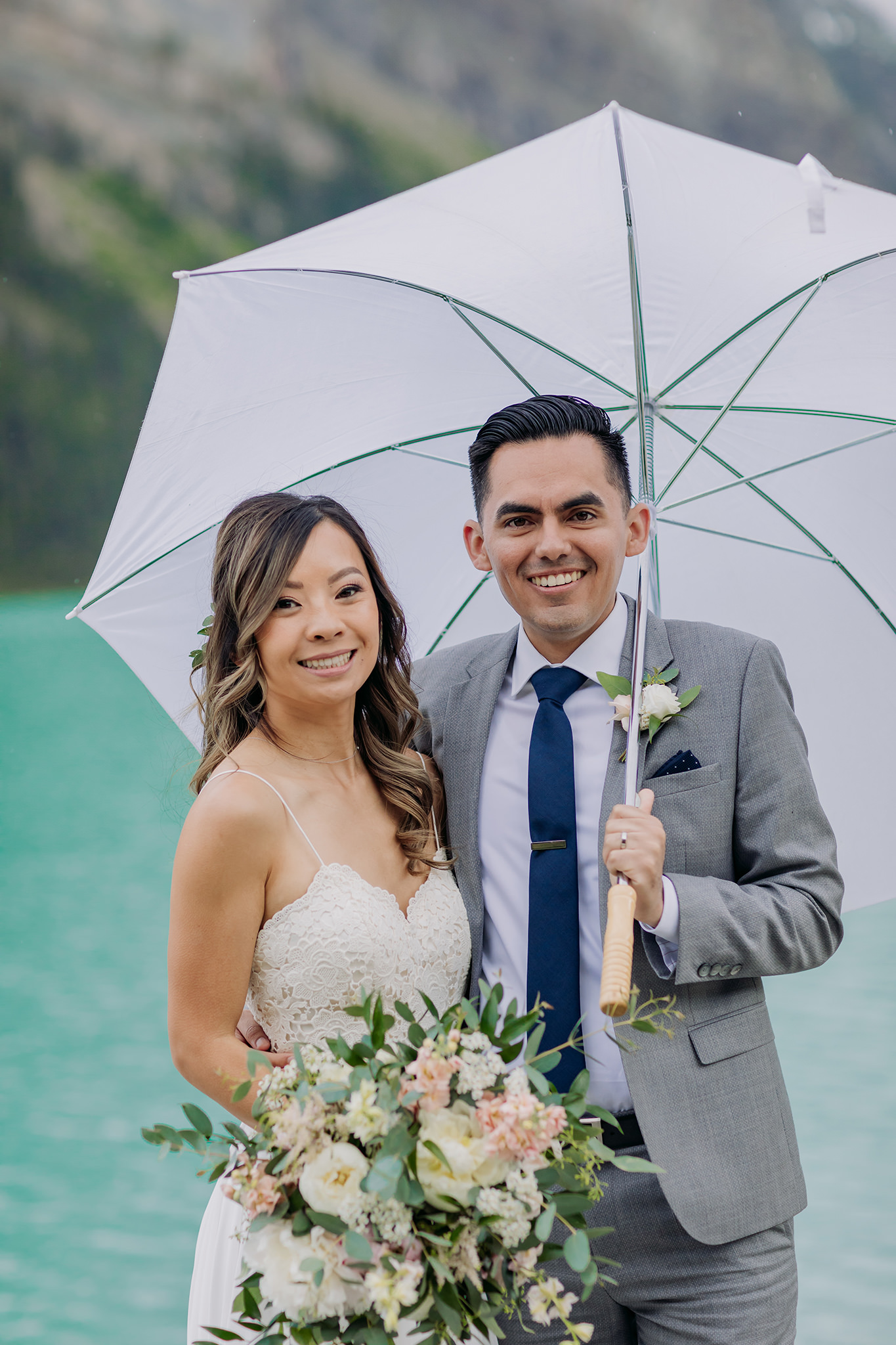 Lake Louise lakeshore wedding ceremony photographed by elopement photographer ENV Photography