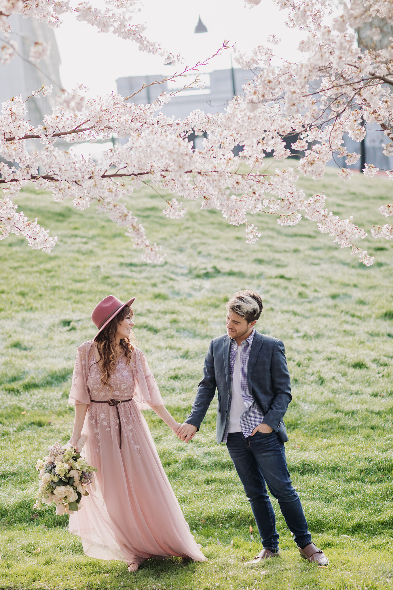 Utah State Capitol Cherry Blossoms engagement couples photo shoot in Salt Lake City, Utah in spring.