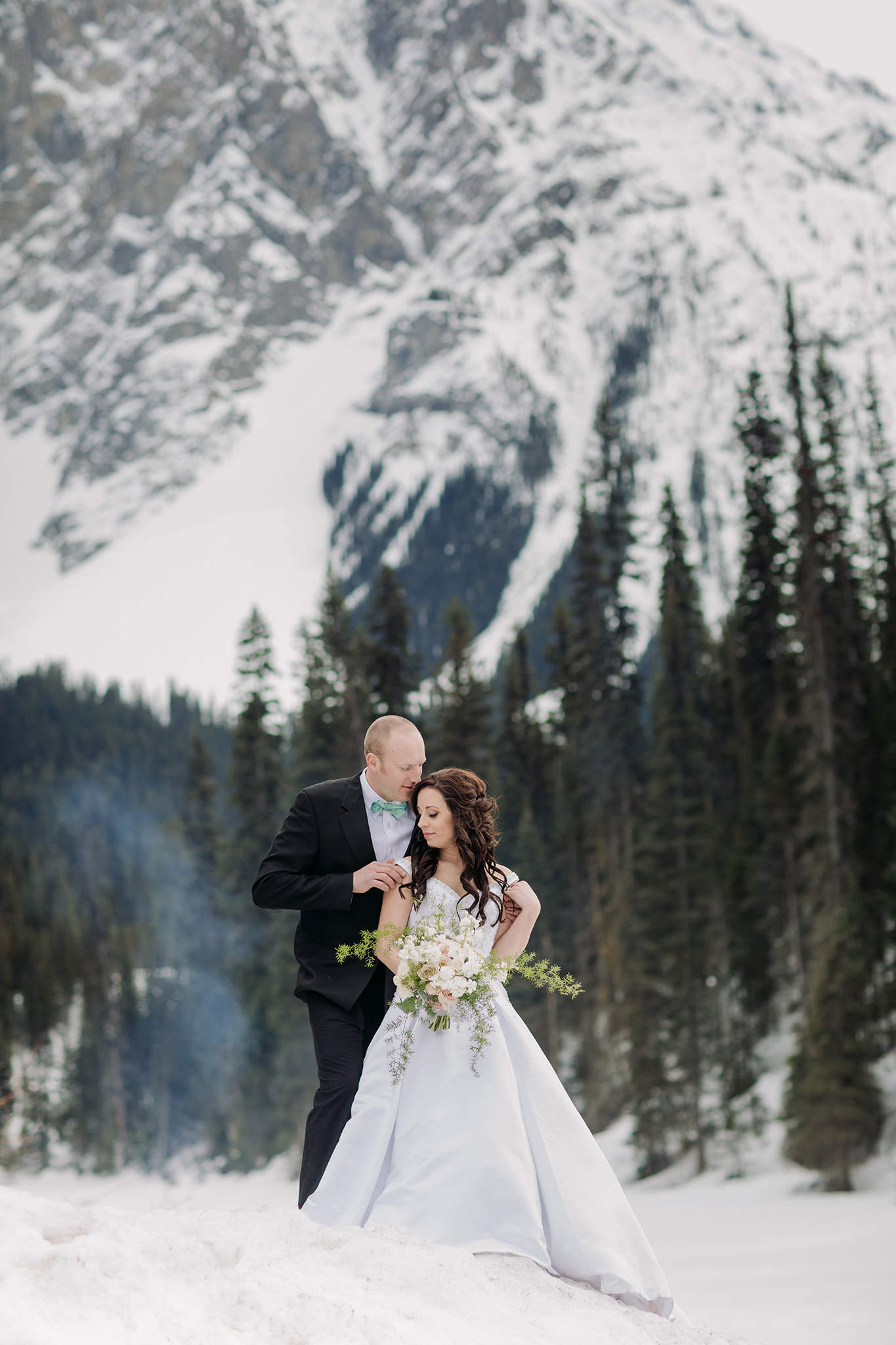 emerald lake lodge wedding spring mountain portraits with fire pit smoke