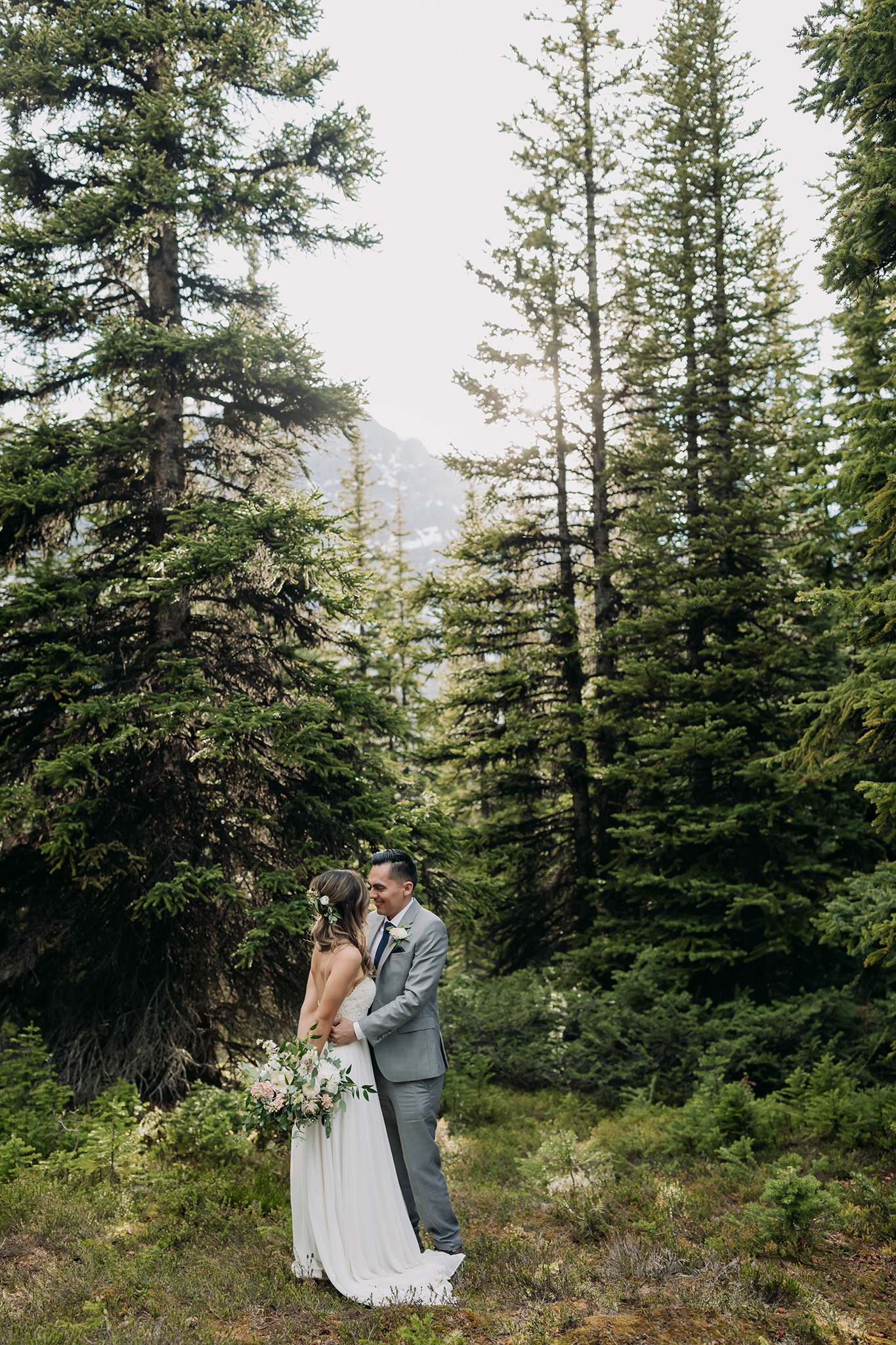 Icefields Parkway elopement Peyto Lake bow summit woodland forest wedding portraits by Banff intimate wedding photographer ENV Photography
