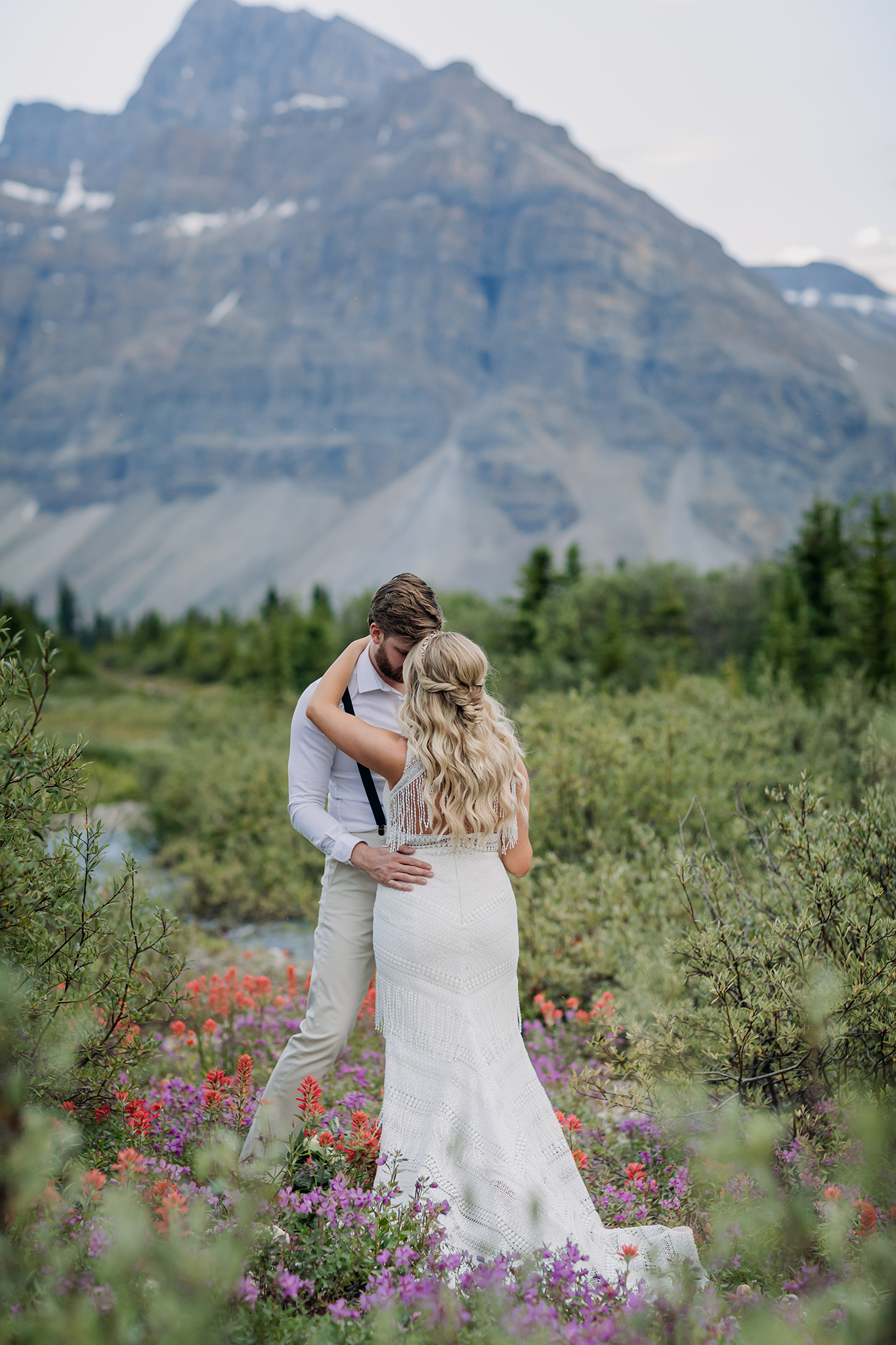 Icefields Parkway elopement in Summer with wildflowers & epic mountain views all around photographed by ENV Photography