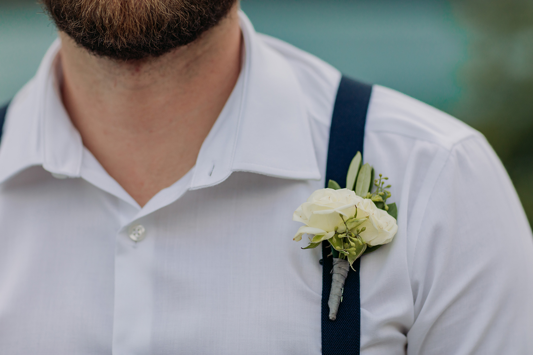 green & White boutonniere by Forget me Not Flowers in Banff