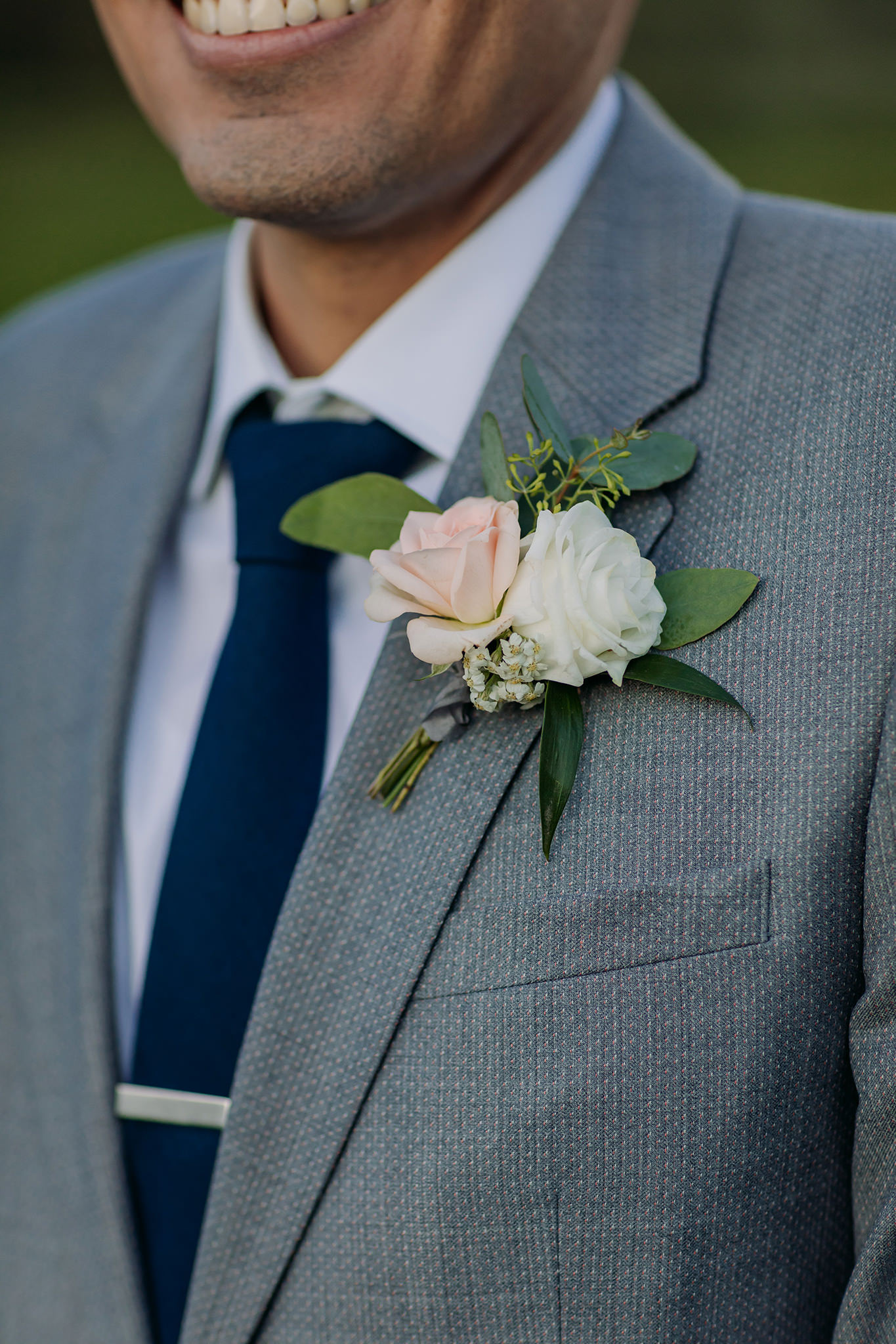 mountain wedding boutonniere in white, green & pink