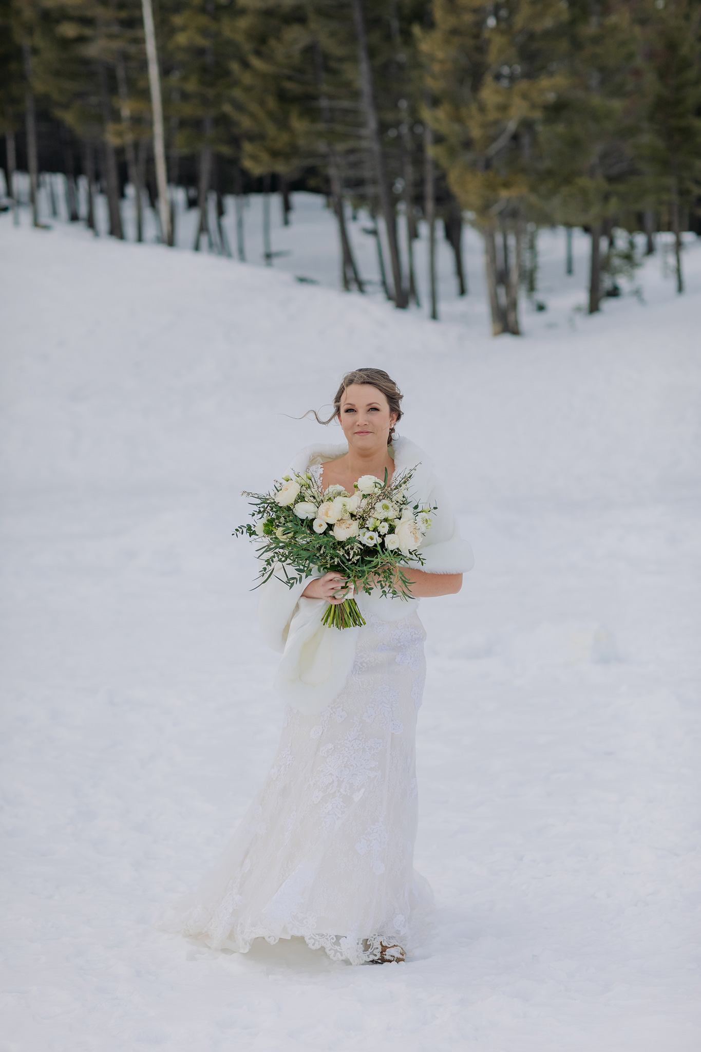 Tunnel Mountain Reservoir bride groom first look in Banff National Park on wedding day. Winter mountain elopement photos