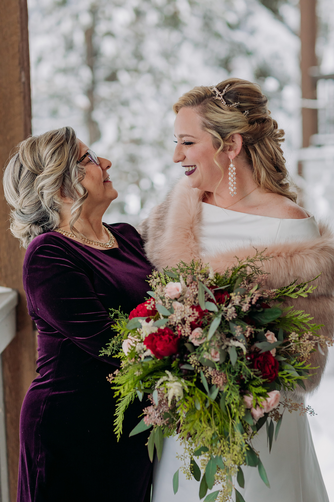 Emerald Lake Lodge winter wedding bride getting ready with family in cozy cabin photographed by mountain elopement photographer ENV Photography
