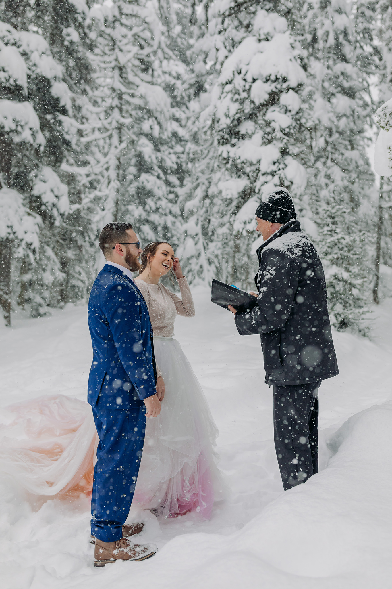 Elope in Lake Louise with a magical snowy outdoor winter wonderland wedding ceremony