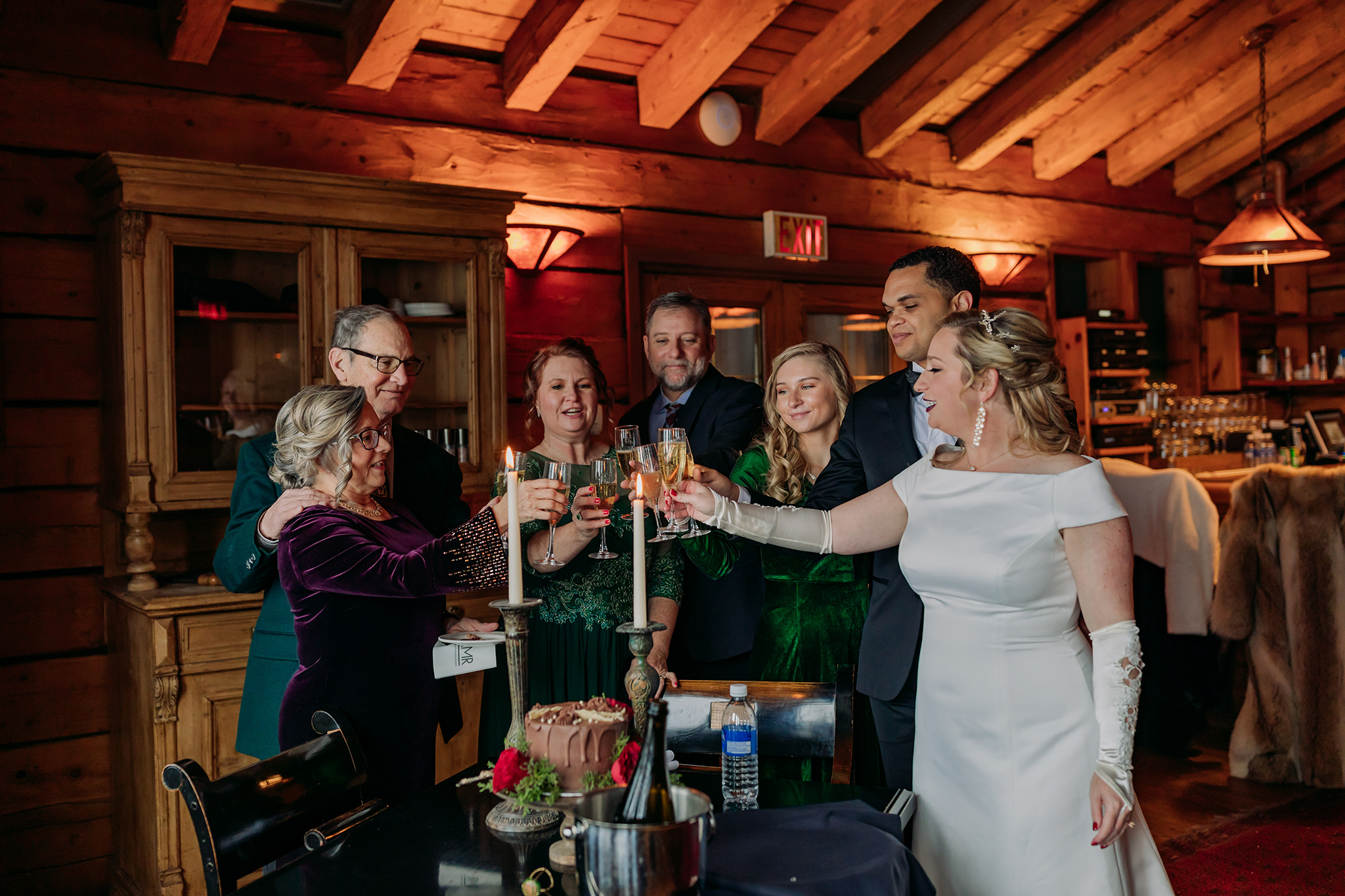 Emerald Lake Lodge afternoon appetizer wedding reception with wedding cake & champagne photographed by mountain elopement photographer ENV Photography