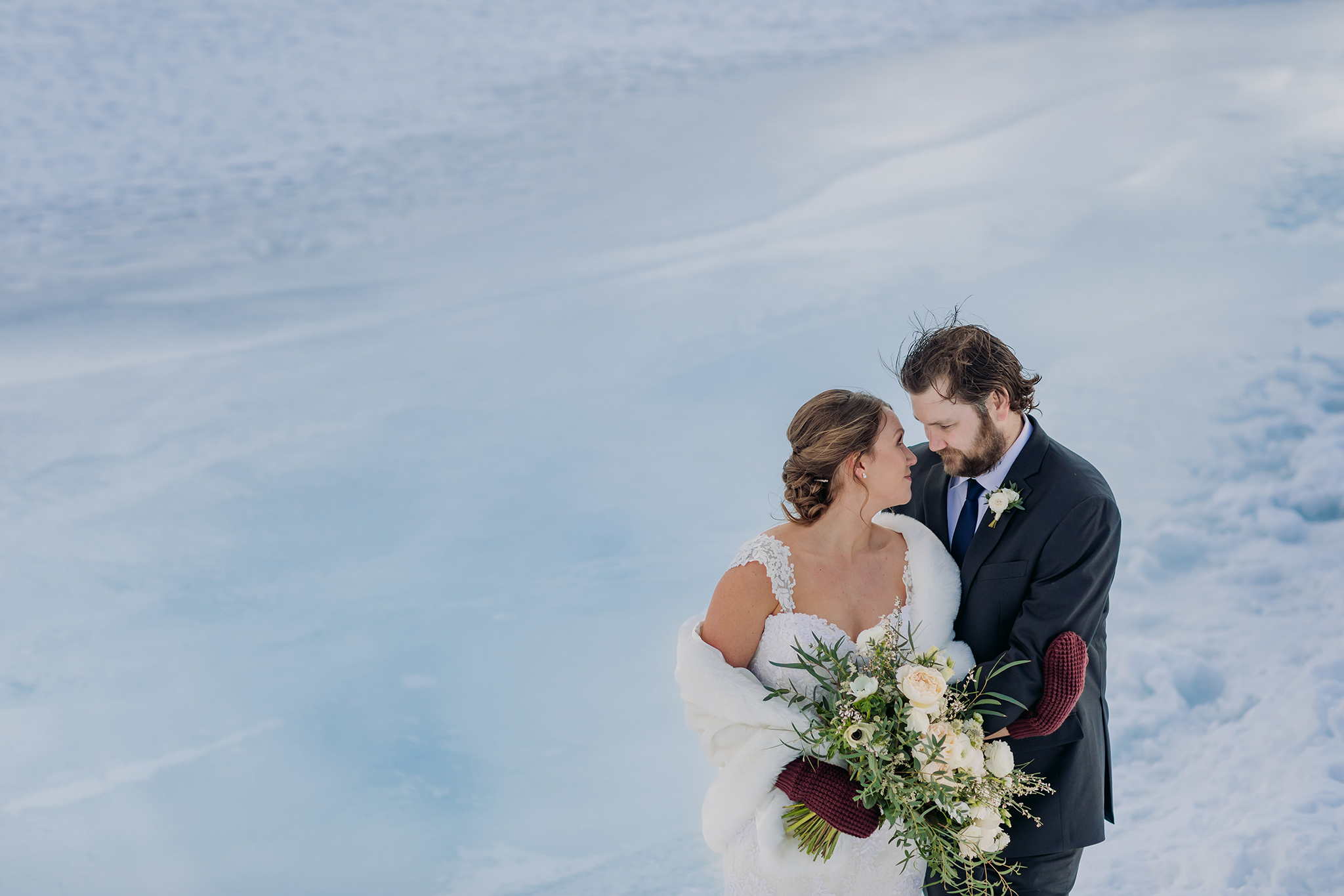 Lake Minnewanka bride & groom portraits Winter mountain wedding photos by Banff Wedding Photographer ENV Photography