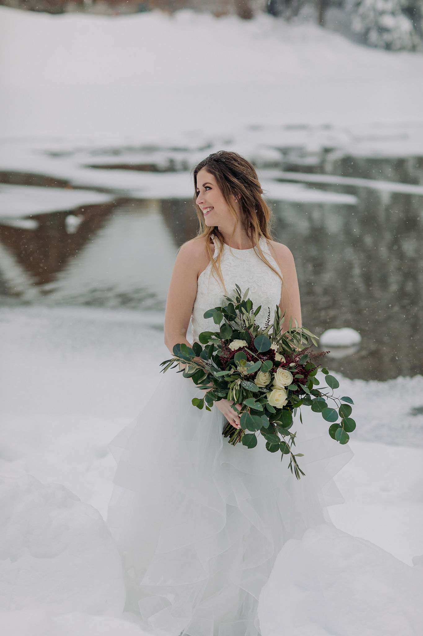 Wedding portraits at Emerald Lake Lodge in Yoho National Park. Mountain wedding in a winter wonderland. Bridal portraits