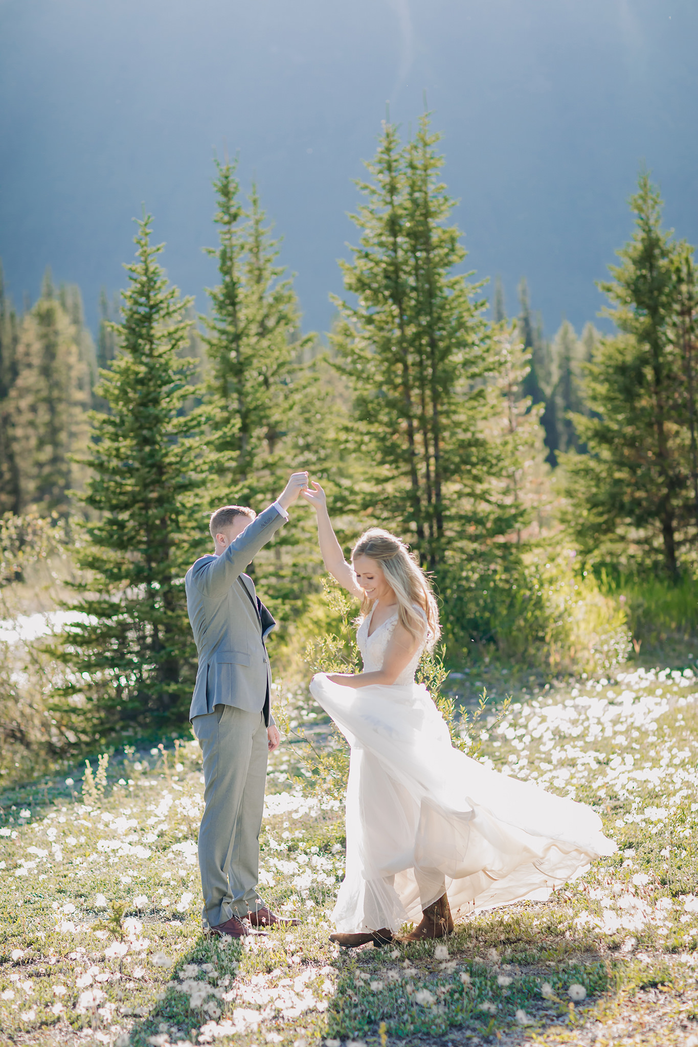 Exploring Icefields Parkway in Banff National Park on their wedding day. Summer mountain elopement at Silverhorn Creek photographed by local wedding & elopement photographer ENV Photography 