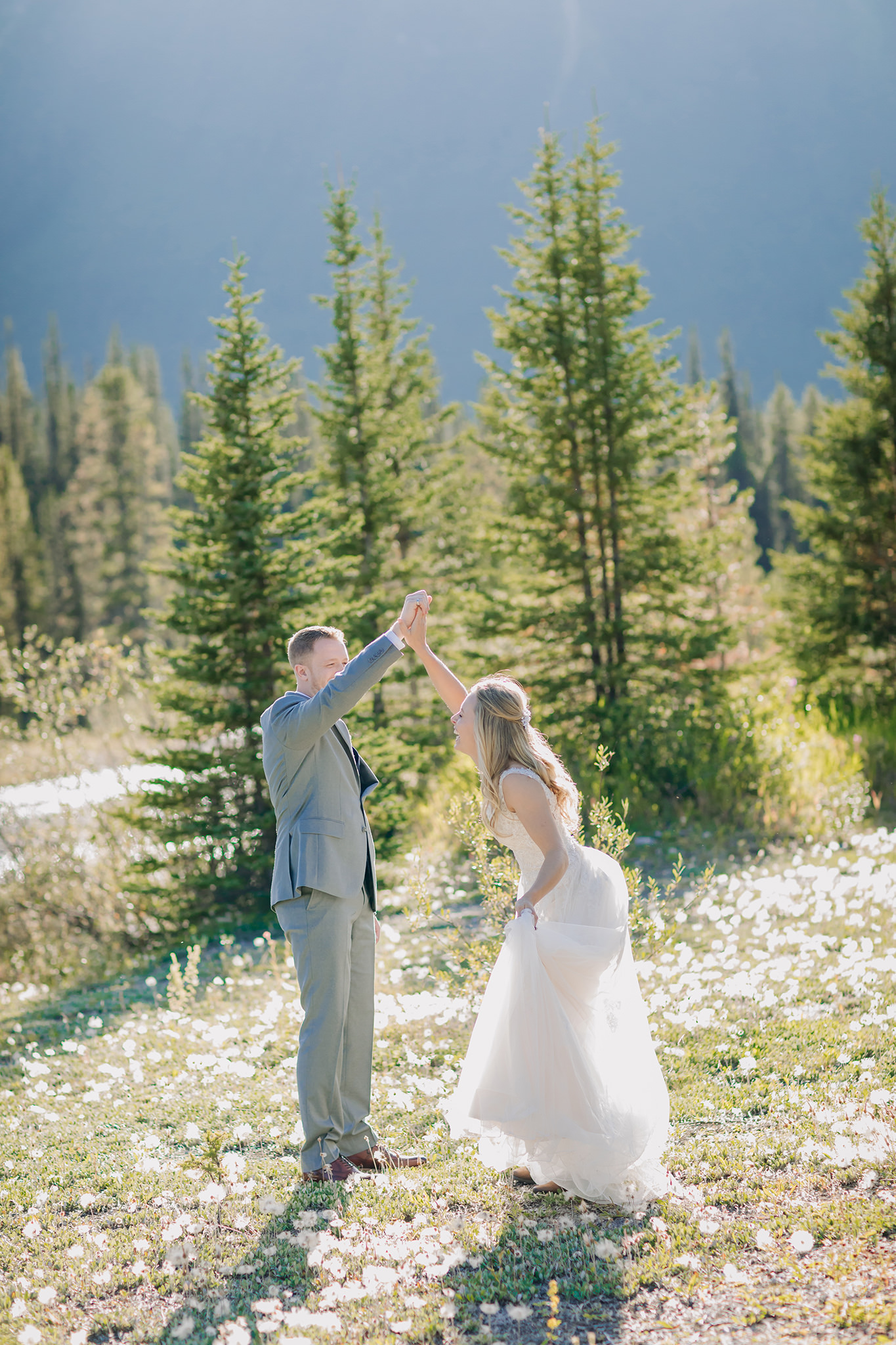 Exploring Icefields Parkway in Banff National Park on their wedding day. Summer mountain elopement at Silverhorn Creek photographed by local wedding & elopement photographer ENV Photography 