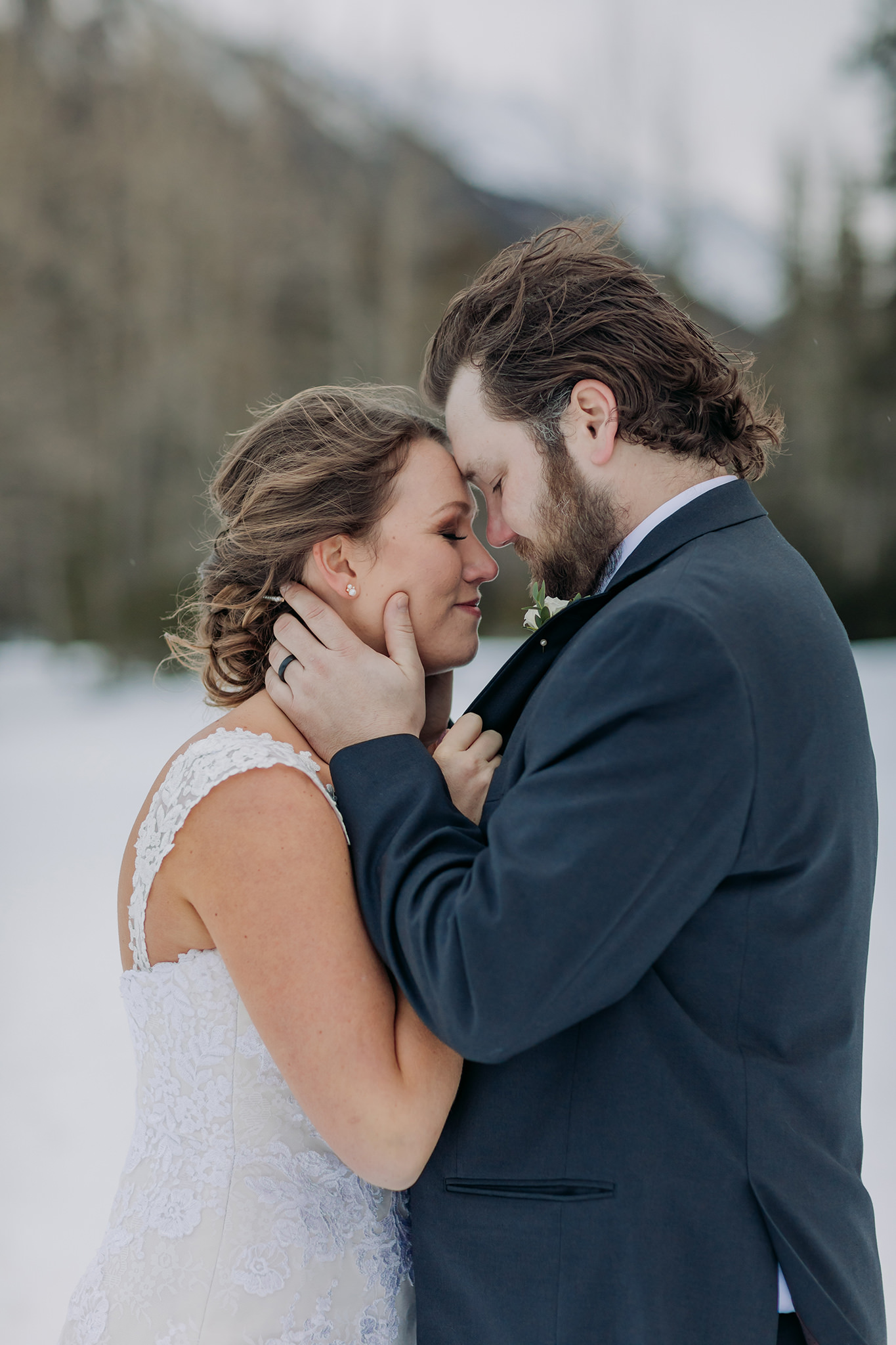 Bow Falls bride & groom portraits Winter mountain wedding photos by Banff Elopement Photographer ENV Photography
