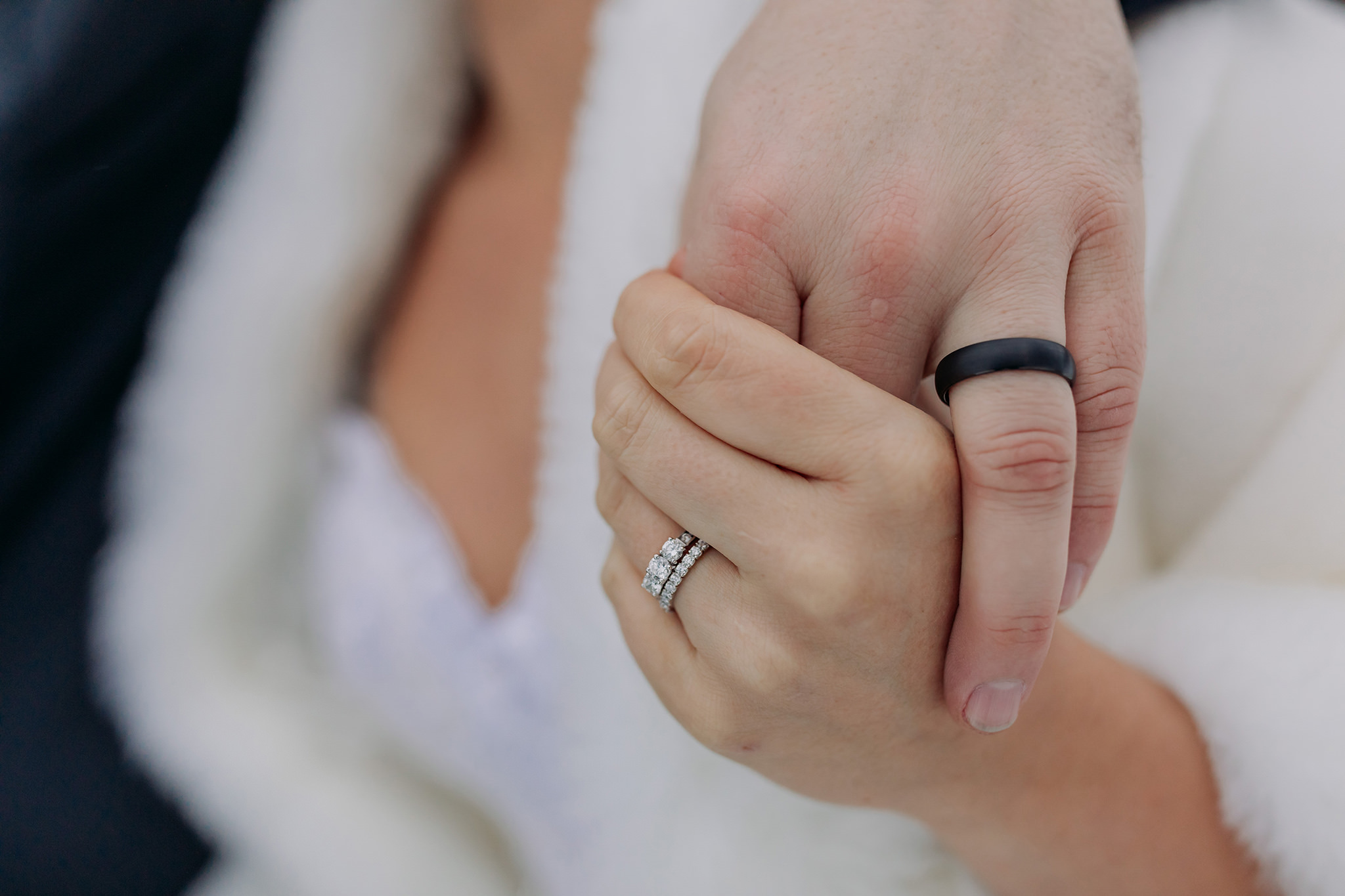 banff elopement bride groom wedding rings on hands