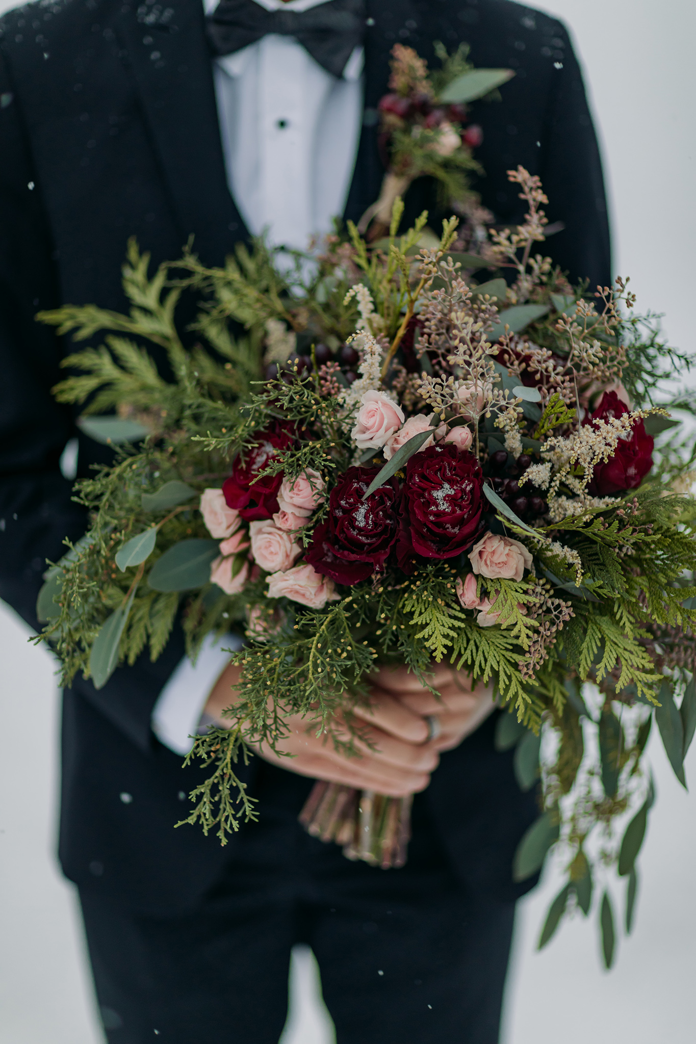 wild unstrucutured winter wedding bouquet for mountain wedding in blush, pink, burgundy & greenery