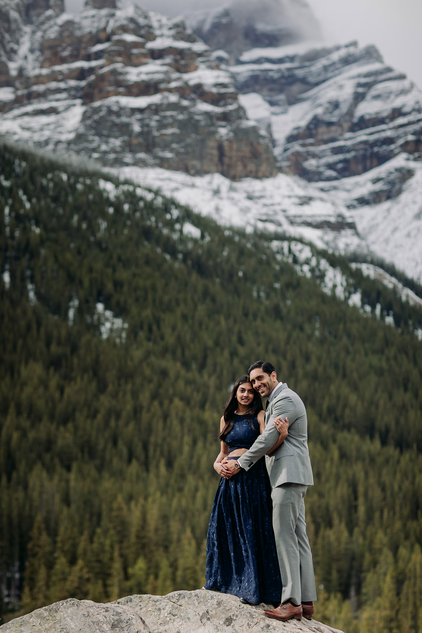 Moraine Lake Stormy Engagement with snow capped mountains