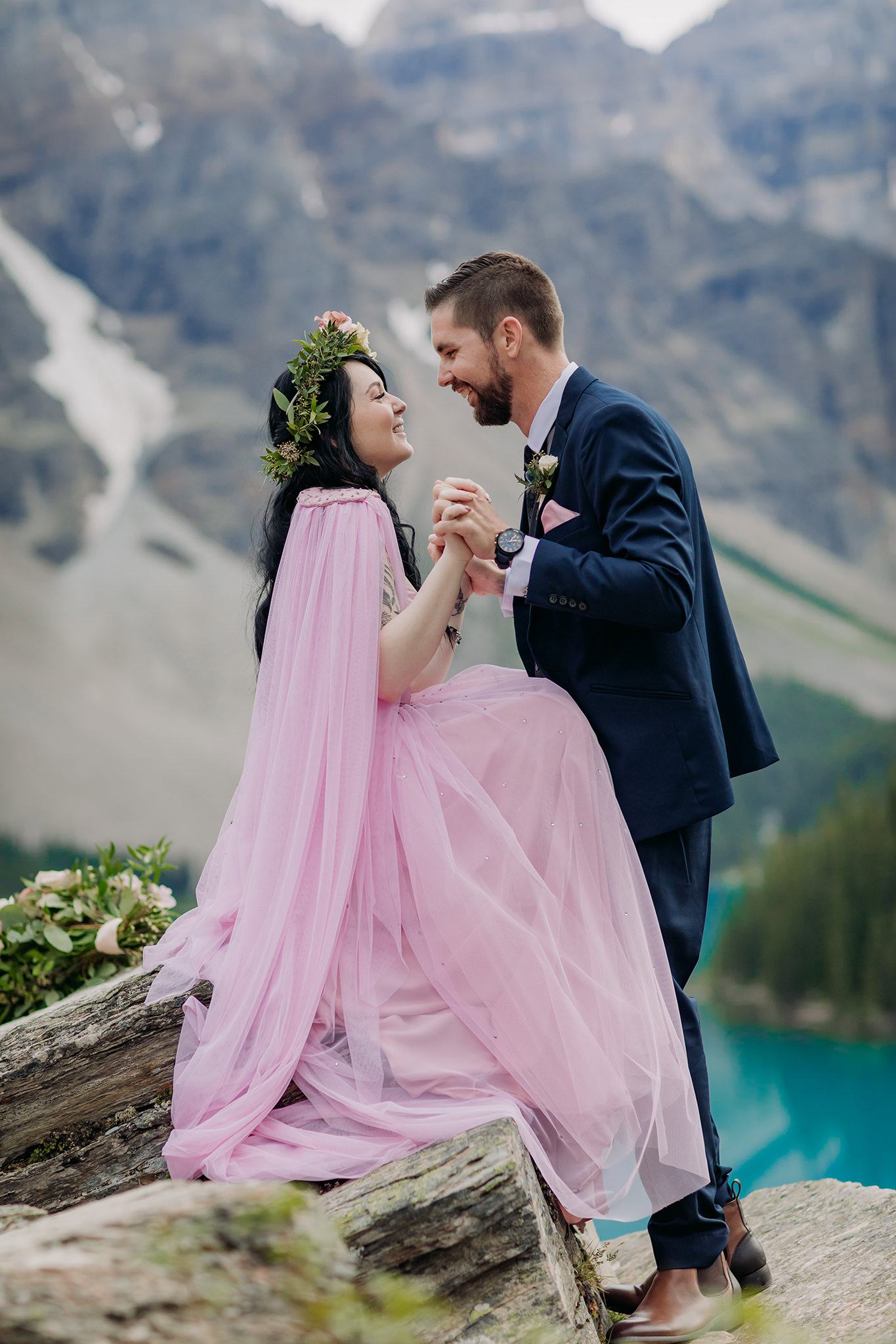 Moraine Lake Lodge elopement in the Canadian Rocky Mountains with boho bride in pink