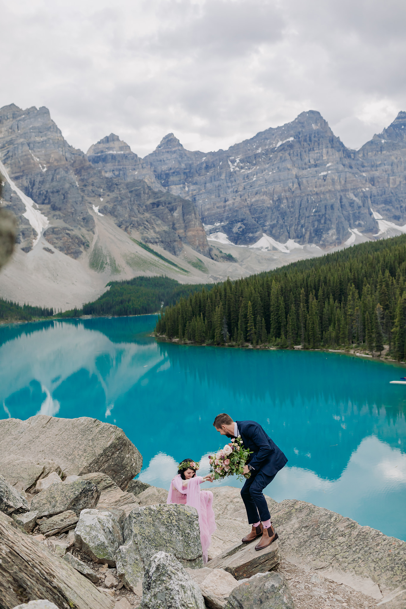 adventurous mountain wedding with bride in pink in the Cnadian Rocky mountains in Summer