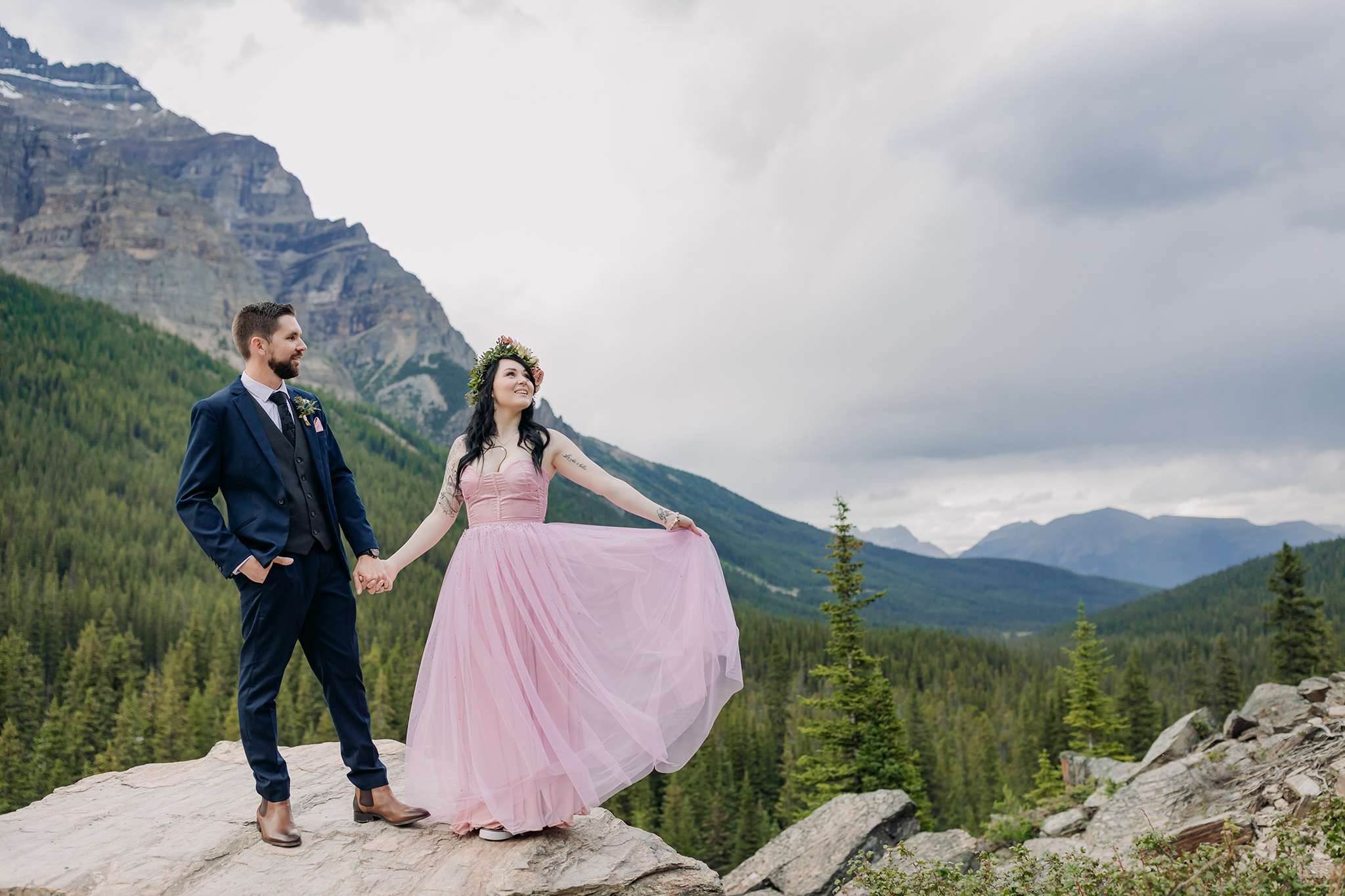 adventurous mountain wedding with bride in pink in the Cnadian Rocky mountains in Summer