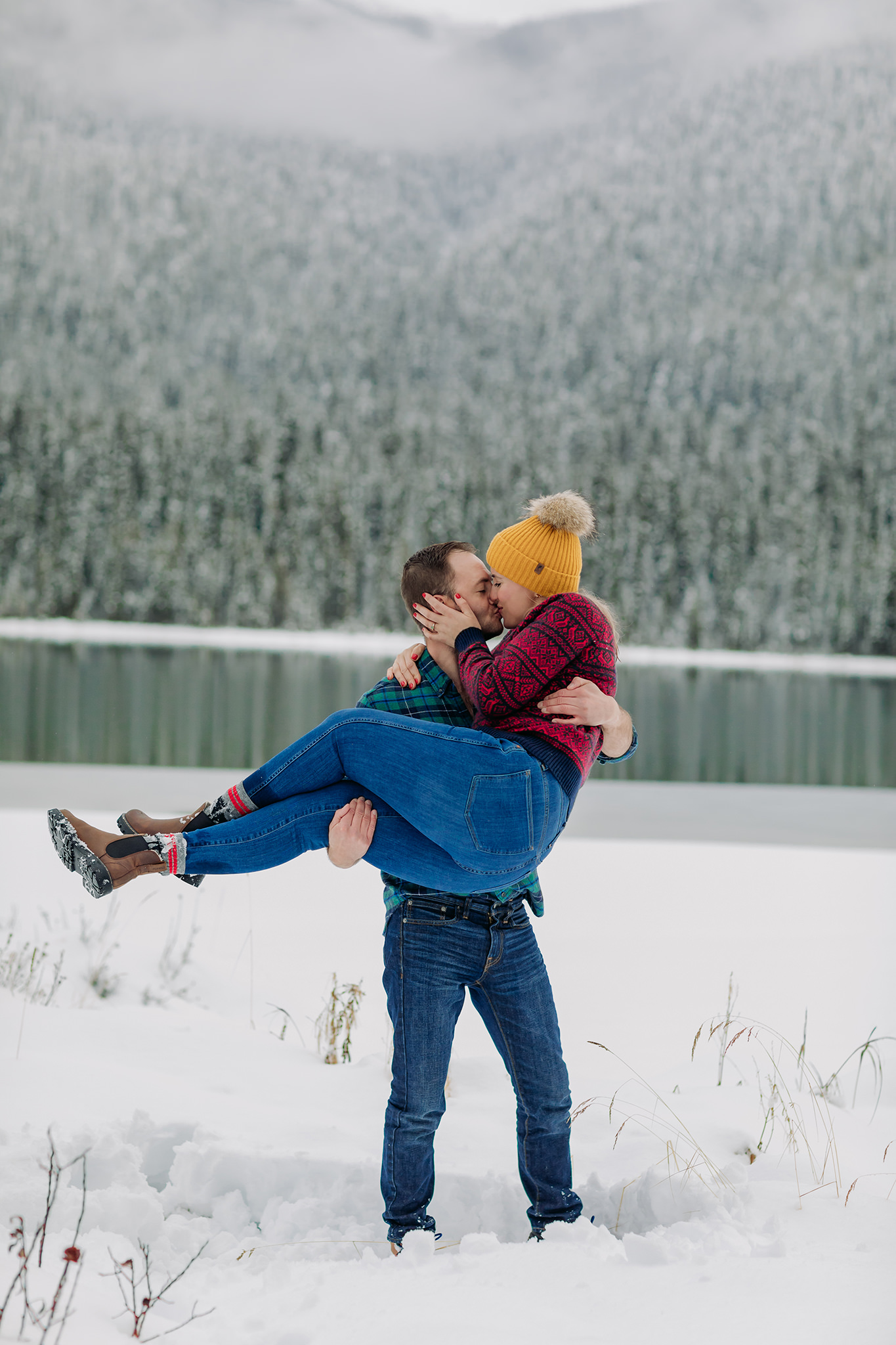 emerald lake winter engagement photos with freshly frozen lake & colourful style
