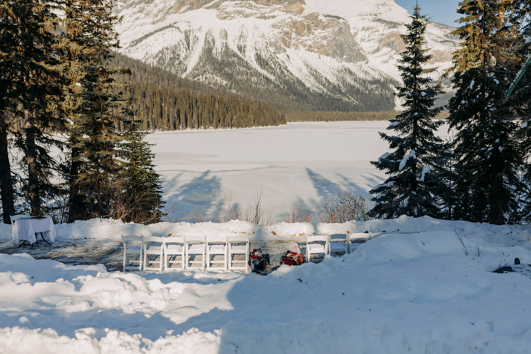 outdoor winter wedding at the viewpoint at Emerald Lake Lodge